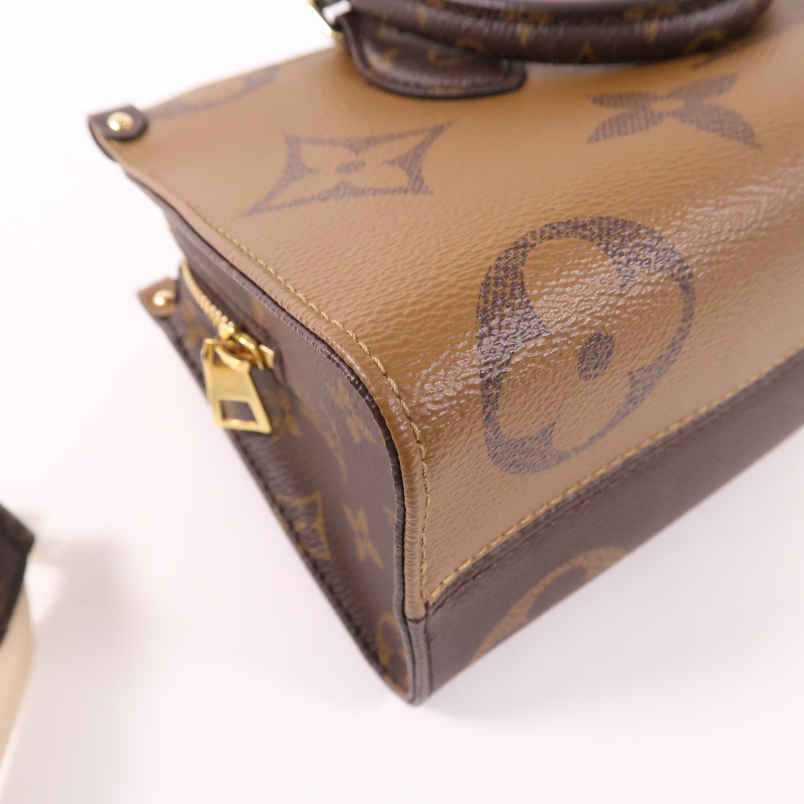 LOUIS VUITTON Monogram Giant Reverse On The Go East West金扣手挽肩背兩用袋