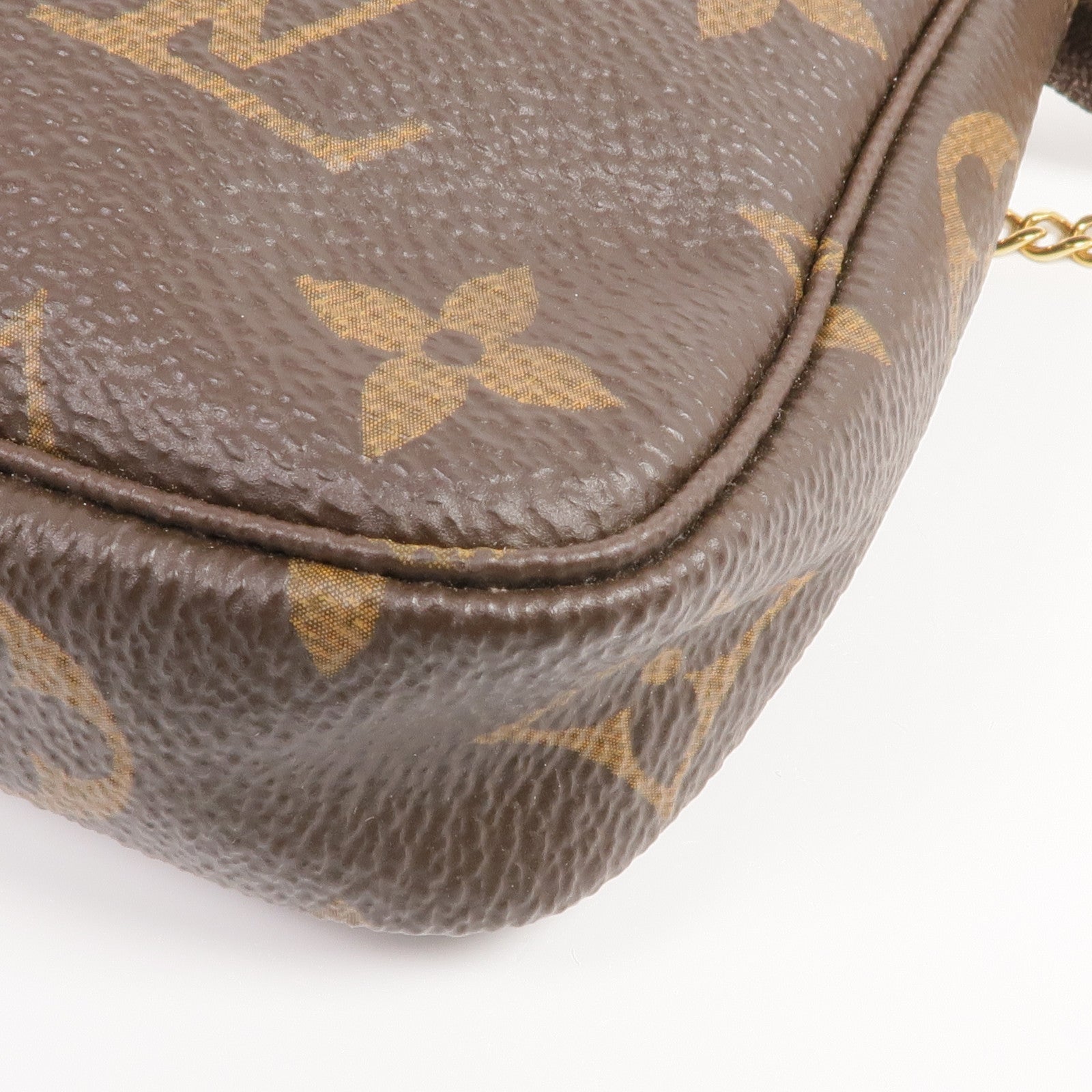 LOUIS VUITTON Monogram Mini Pochette Accessoires金扣手挽袋