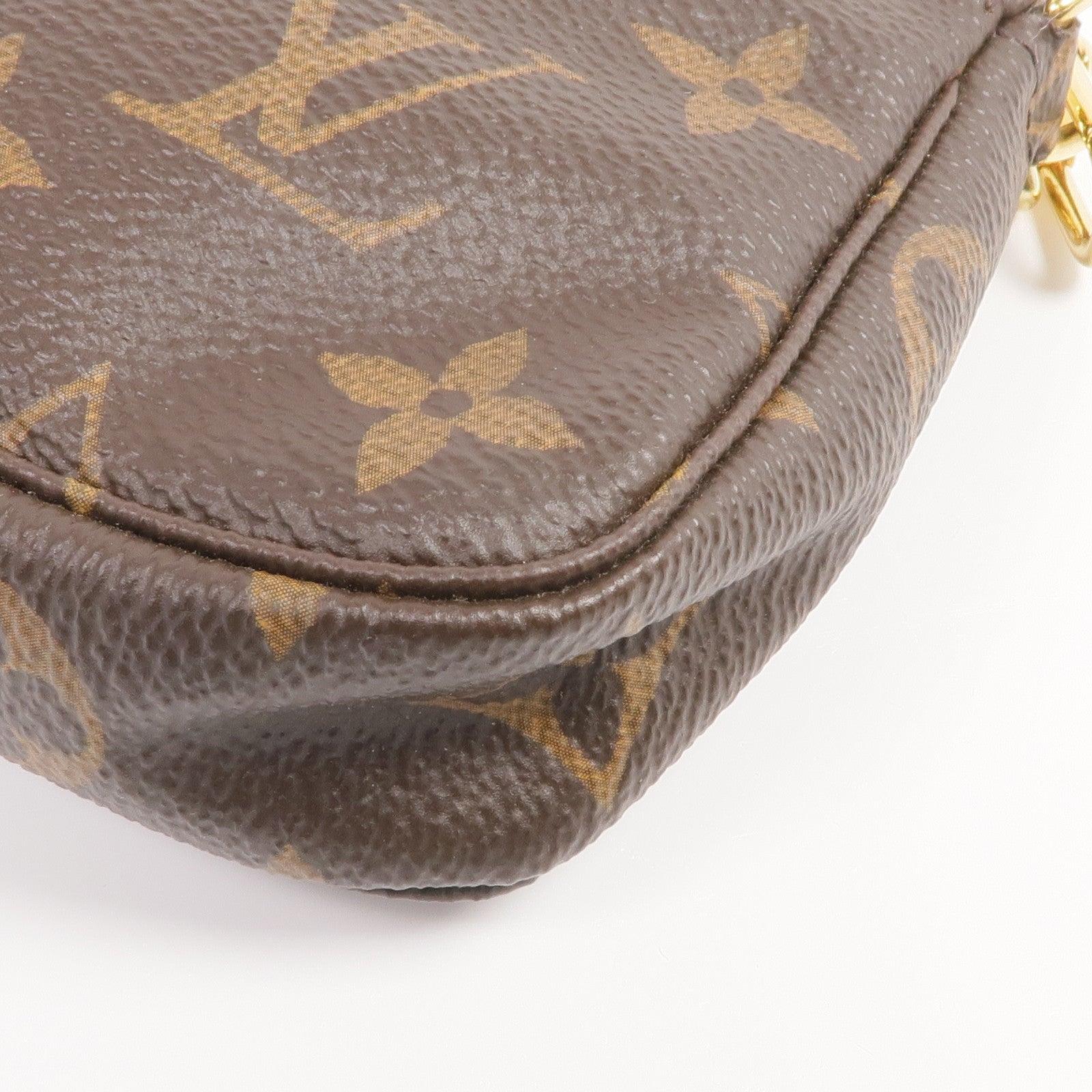 LOUIS VUITTON Monogram Mini Pochette Accessoires金扣手挽袋