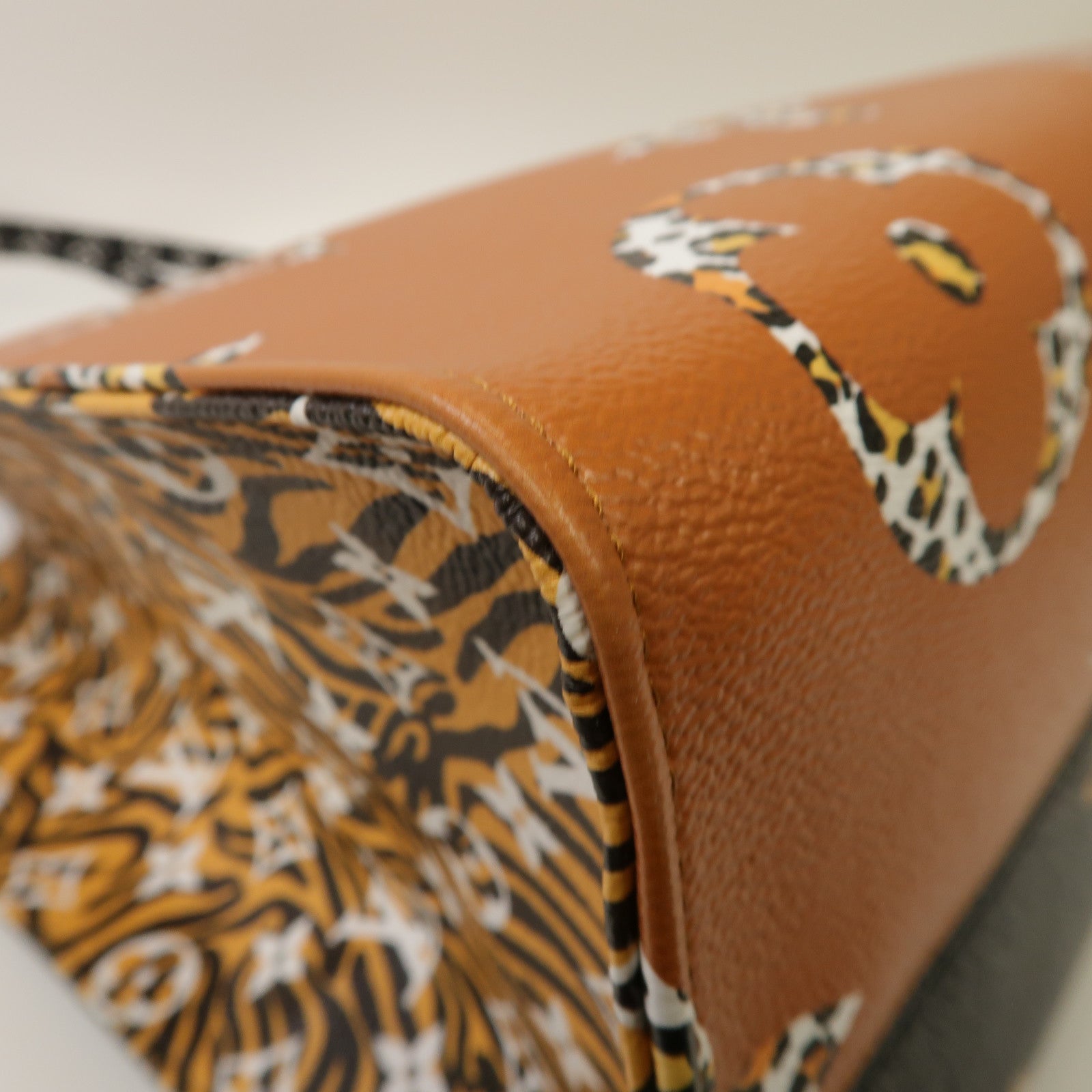 LOUIS VUITTON 【激減優惠】Monogram Jungle On The Go GM金扣手挽肩背兩用袋黑色/啡色