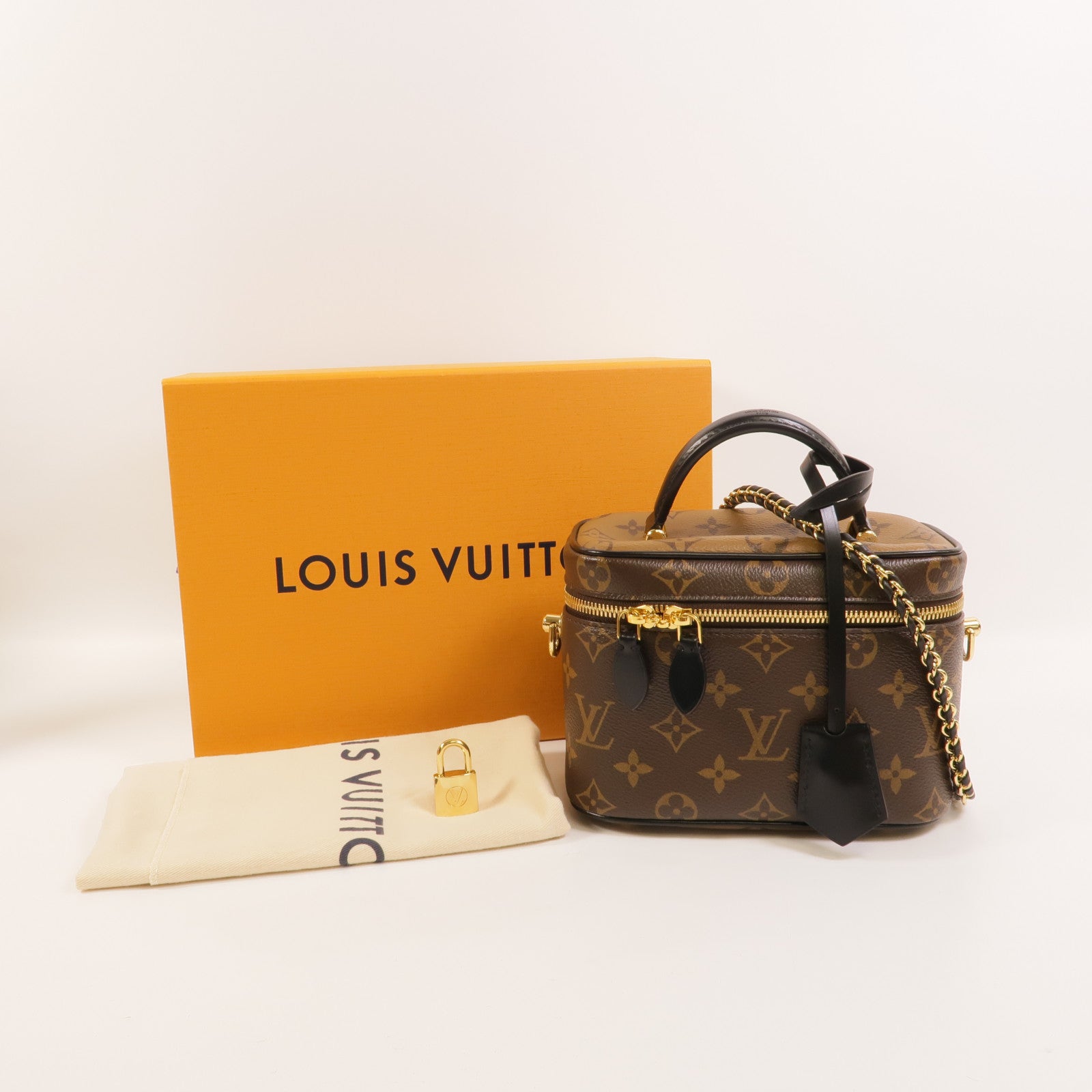 LOUIS VUITTON Monogram Reverse Vanity PM金扣手挽肩背兩用袋棕色