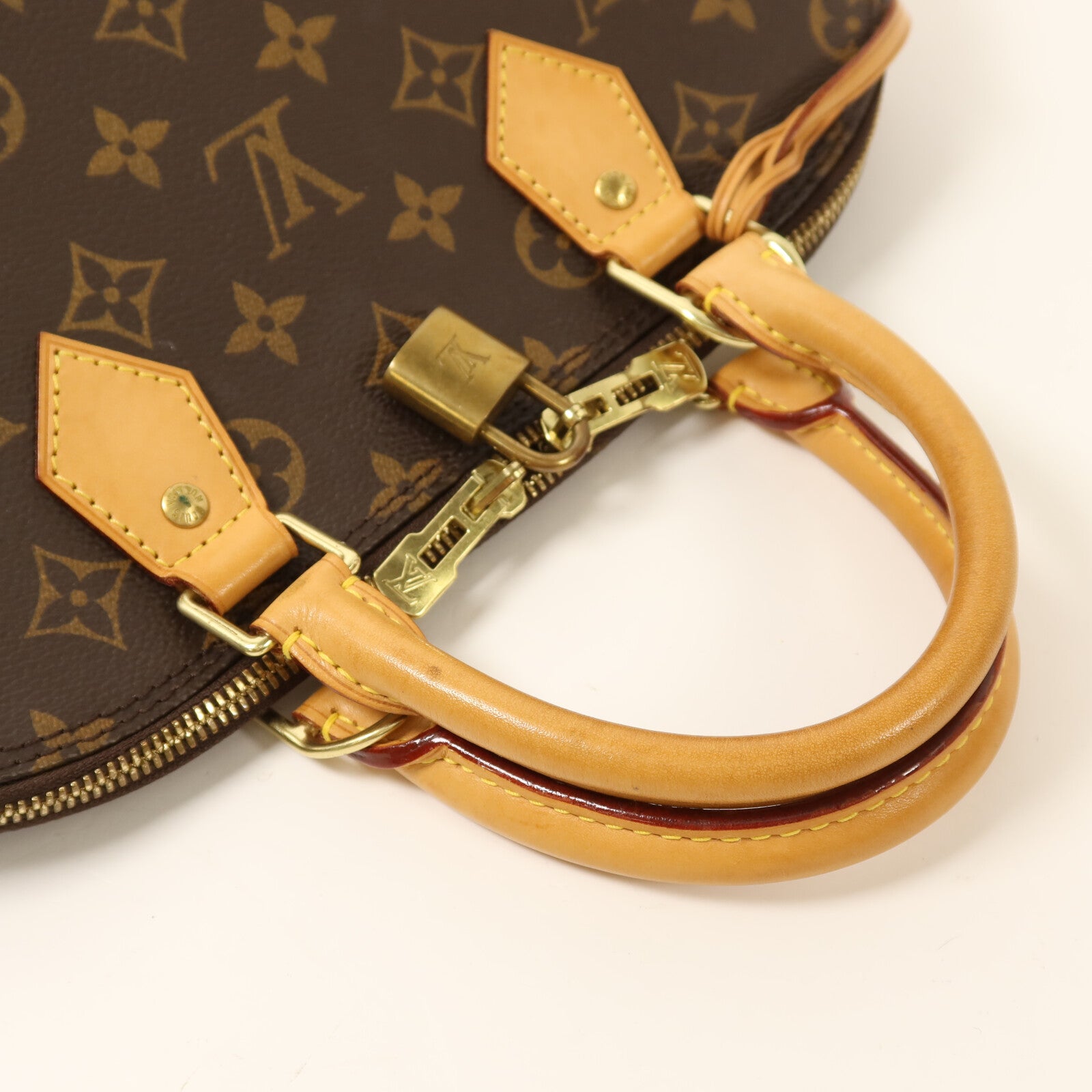 LOUIS VUITTON Monogram Alma金扣手挽袋