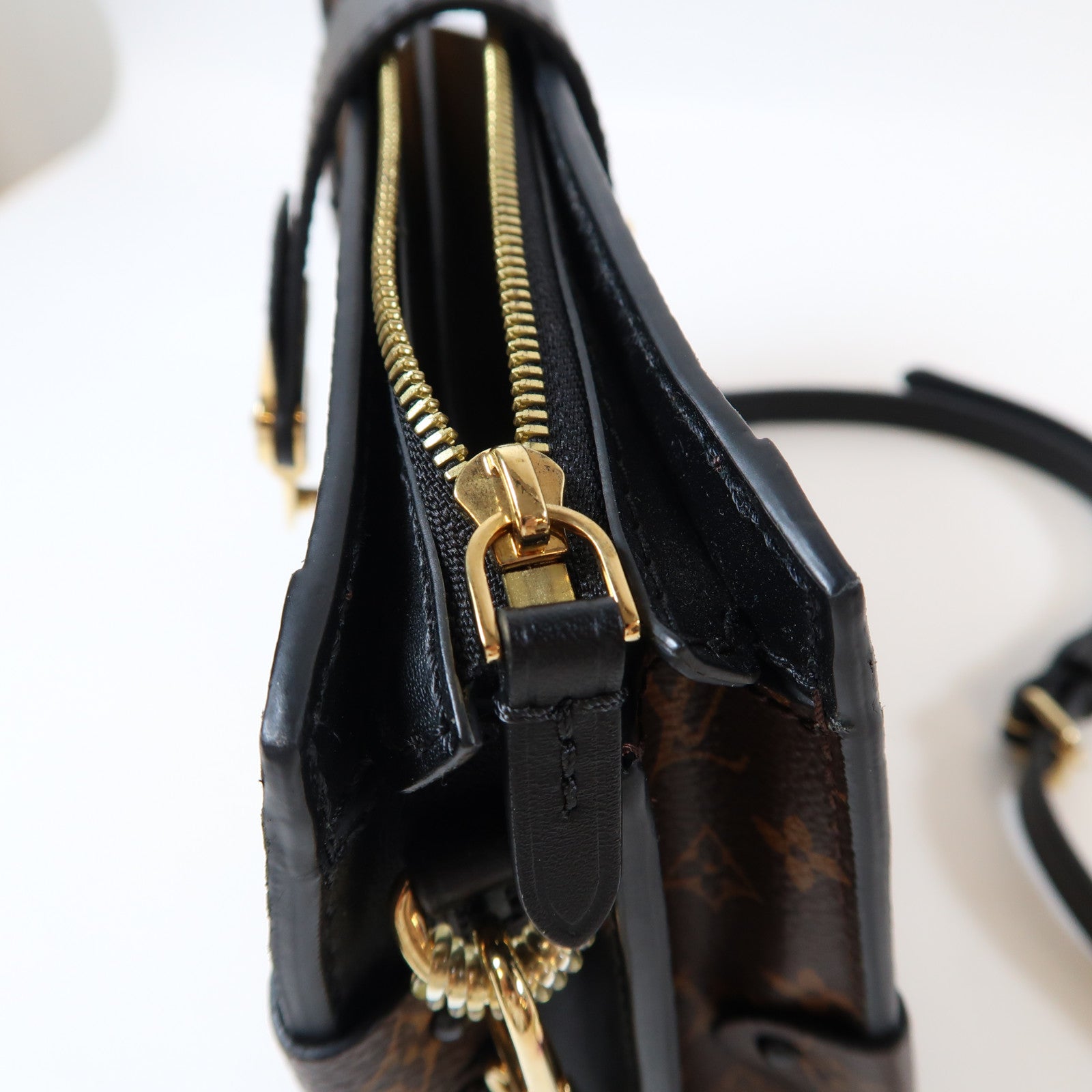 LOUIS VUITTON Monogram Reverse Trunk Clutch金扣肩背袋啡色