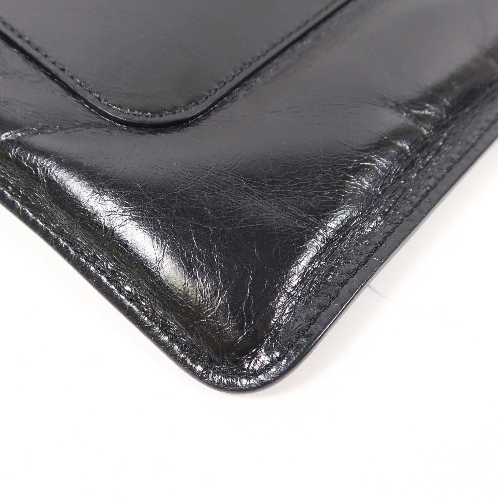 CHANEL 皮革Feminine Pouch Large銀扣手拿包黑色