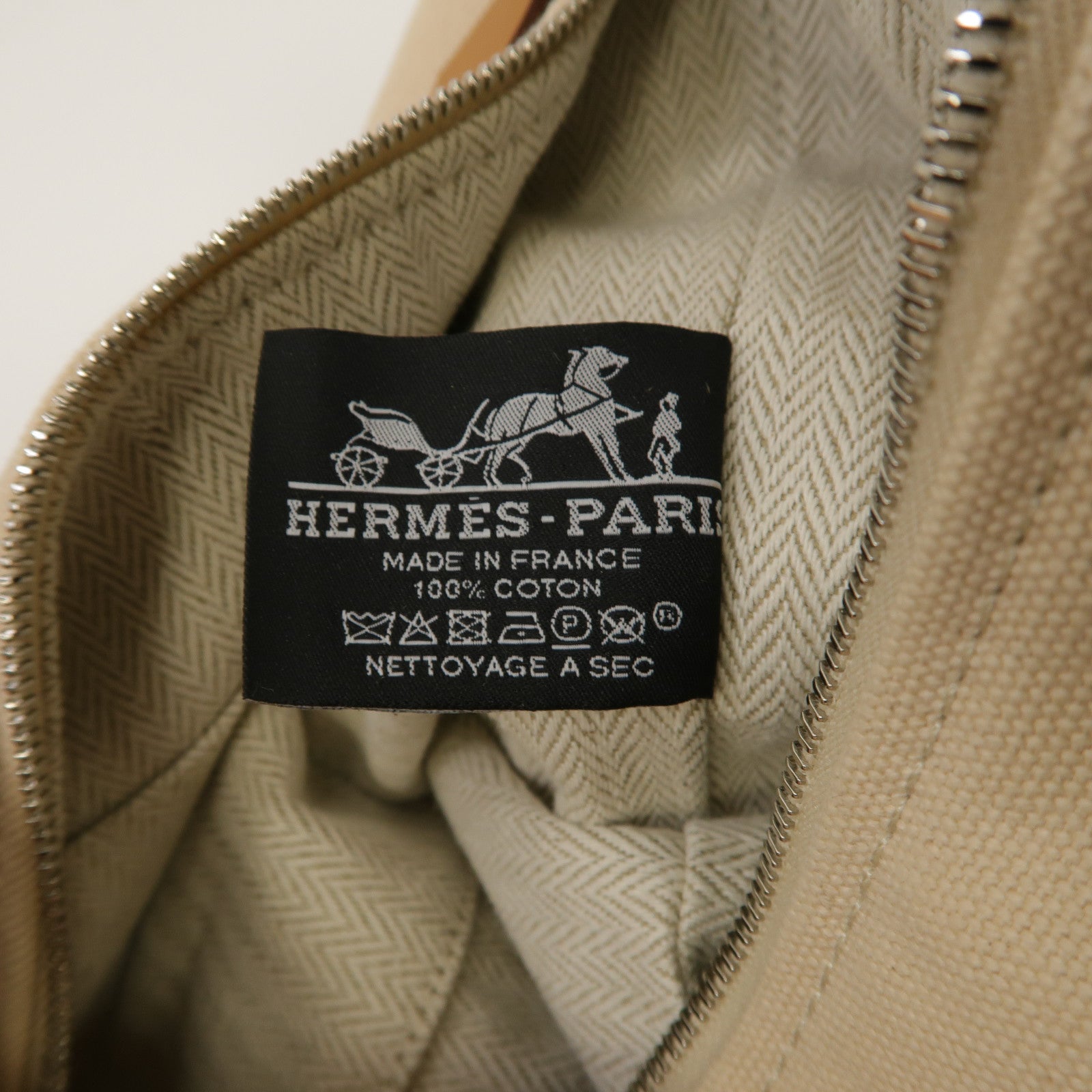 HERMES 帆布Bride-a-Brac Case銀扣手挽袋米色