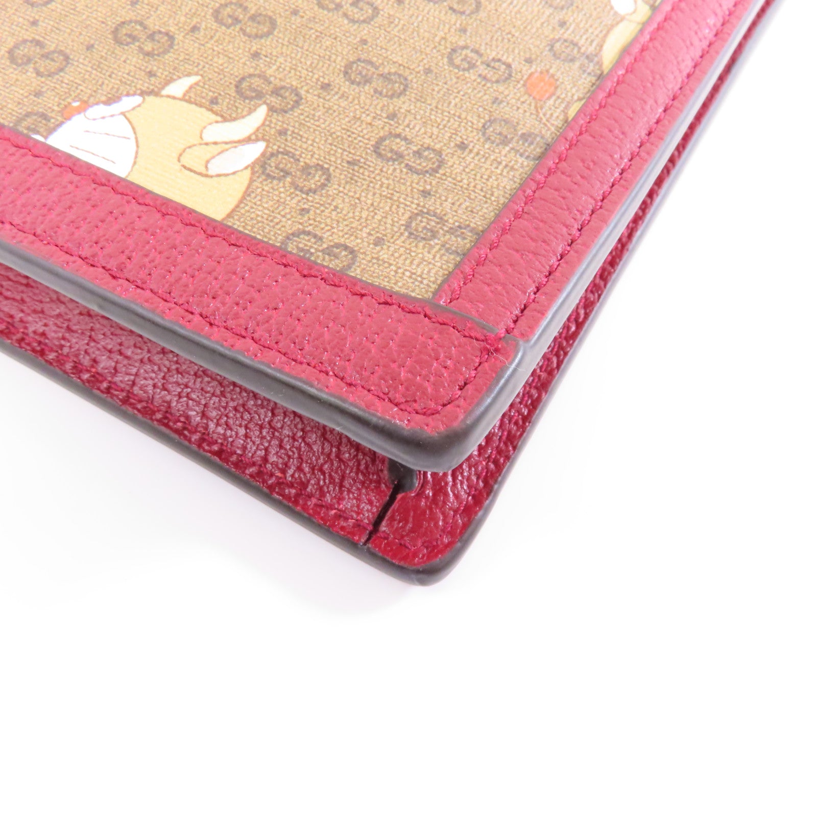 GUCCI 【激減優惠】塗層帆布Gucci x Doraemon Clutch Bag金扣手拿包啡色/紅色