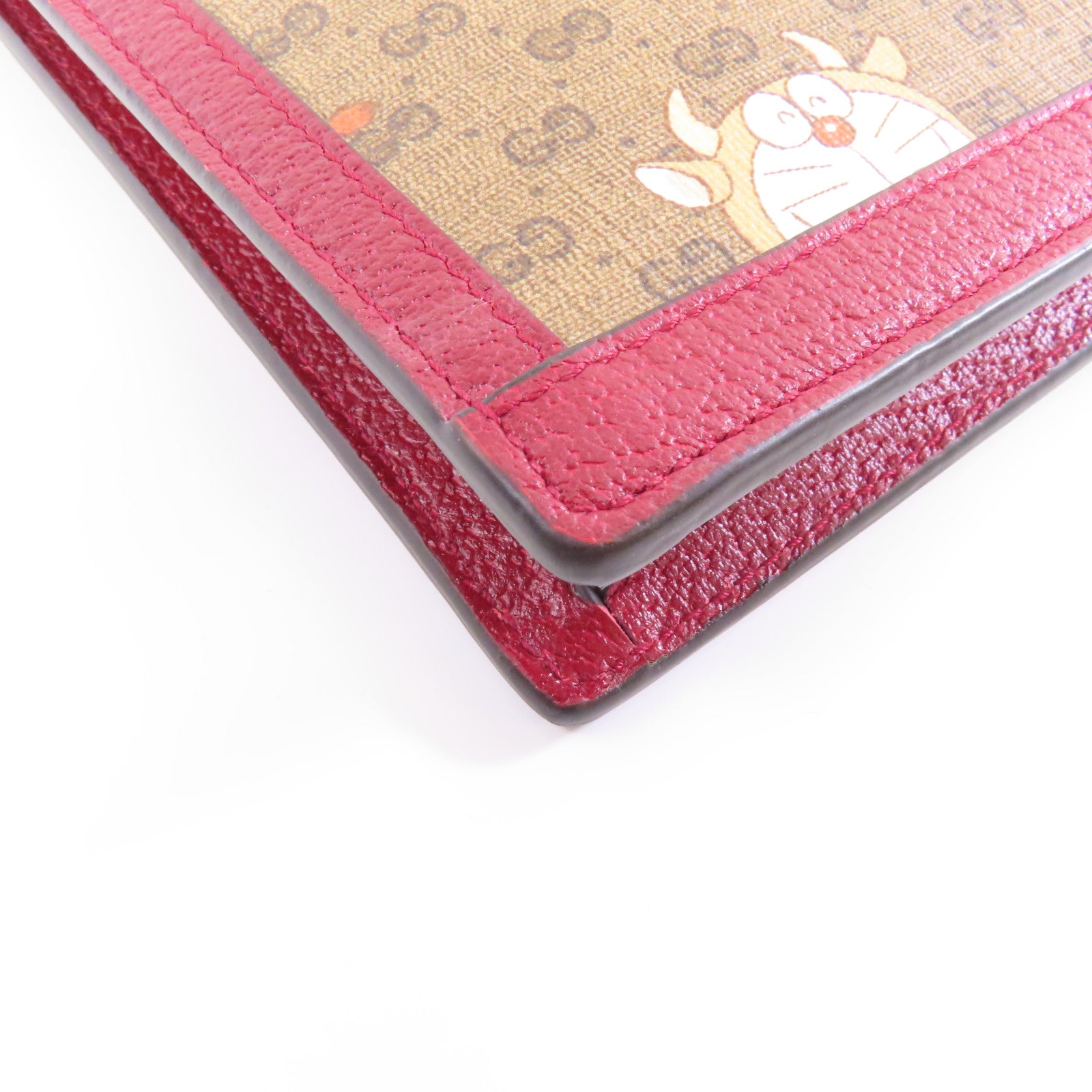 GUCCI 【激減優惠】塗層帆布Gucci x Doraemon Clutch Bag金扣手拿包啡色/紅色