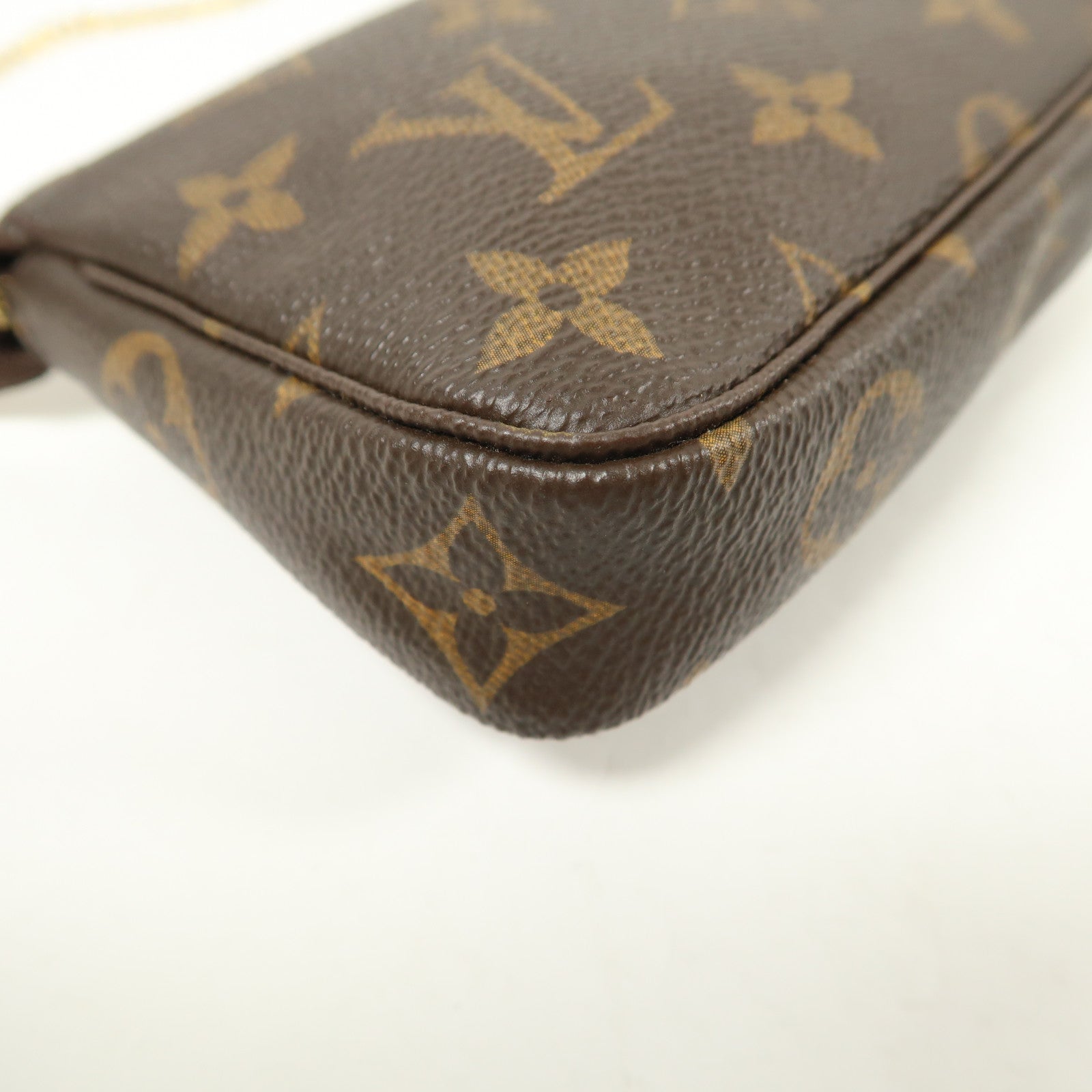 LOUIS VUITTON Monogram Mini Pochette Accessoires金扣手挽袋棕色