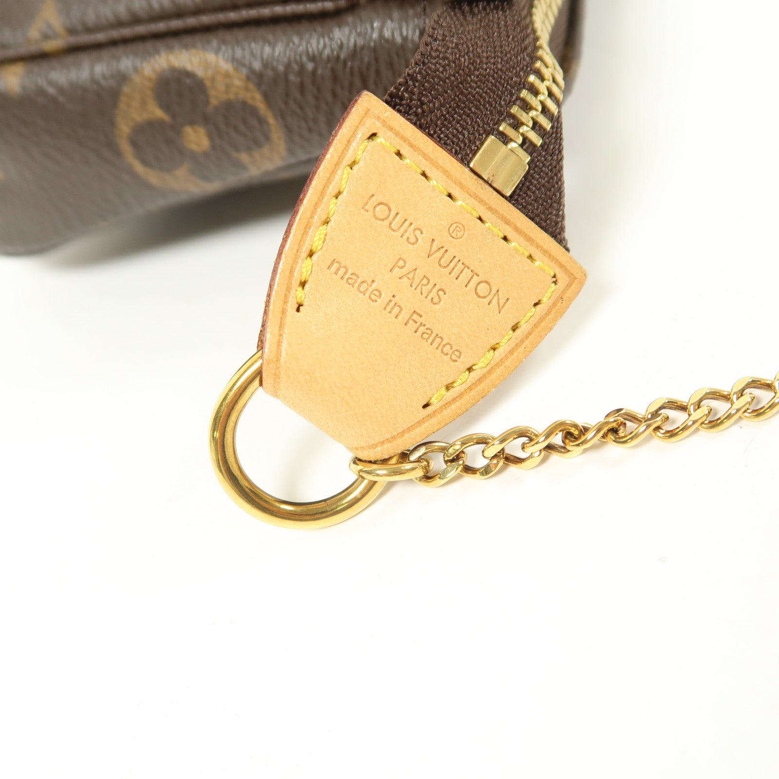 LOUIS VUITTON Monogram Mini Pochette Accessoires金扣手挽袋棕色