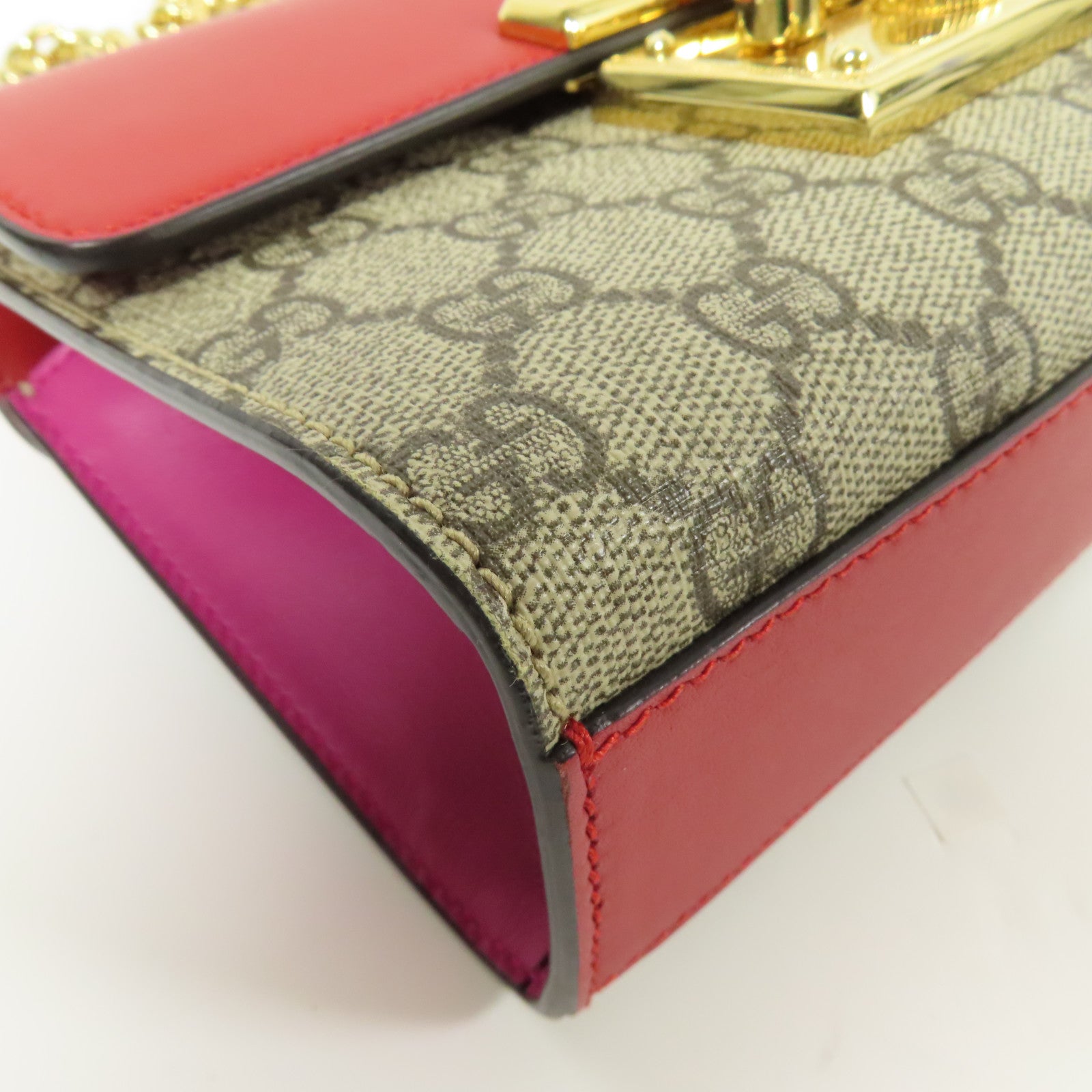 GUCCI 塗層帆布Paddle Lock Small金扣肩背袋