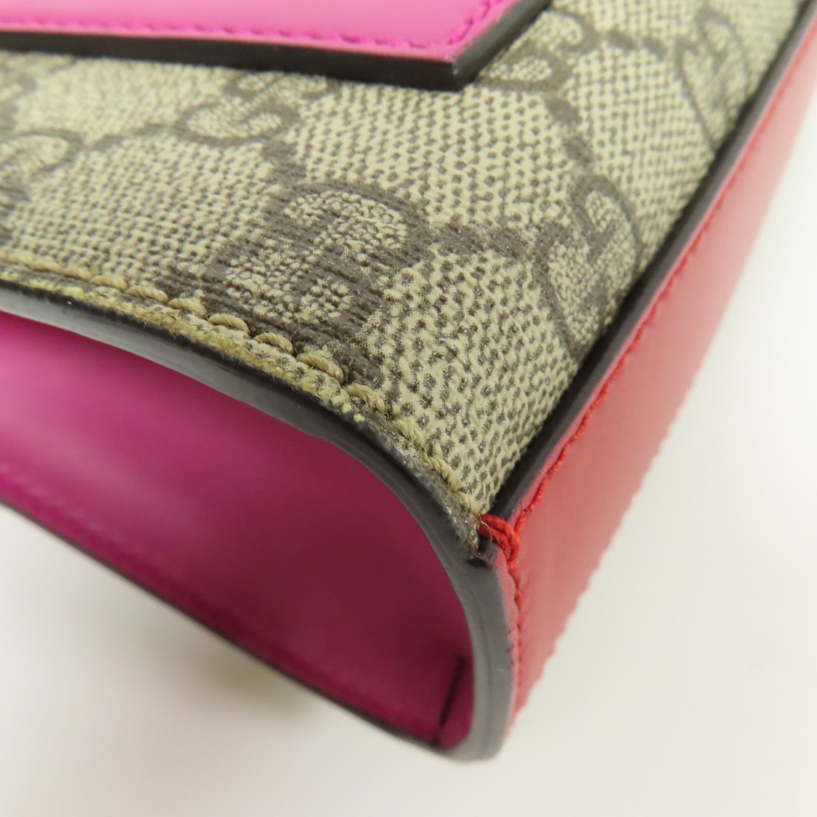 GUCCI 塗層帆布Paddle Lock Small金扣肩背袋