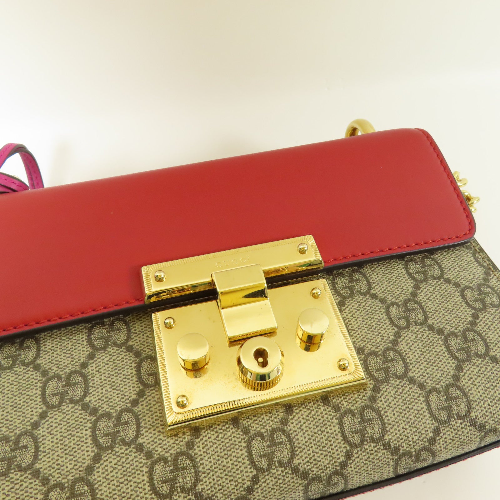 GUCCI 塗層帆布Paddle Lock Small金扣肩背袋