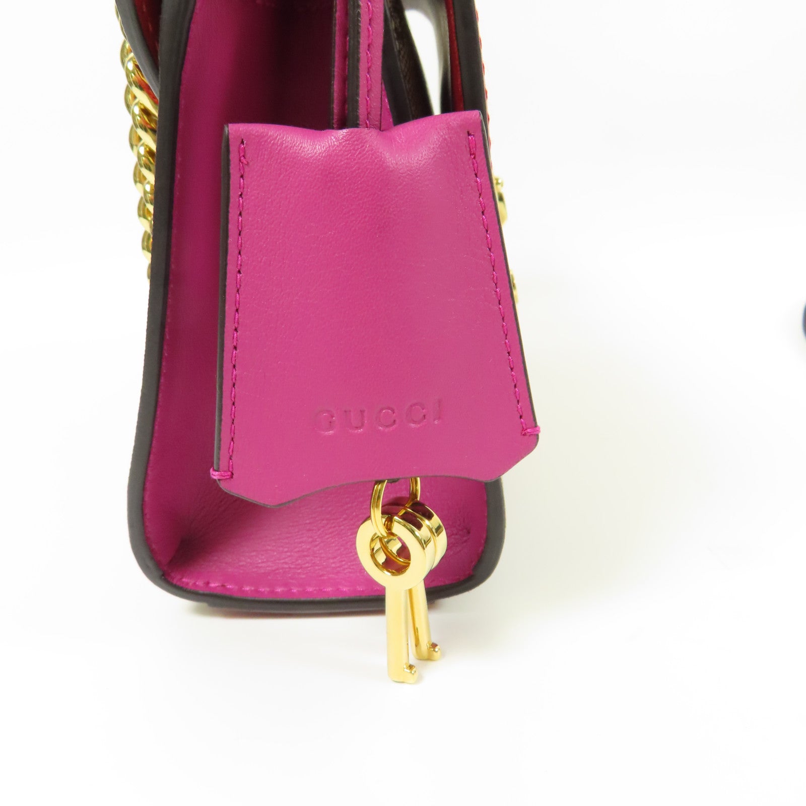 GUCCI 塗層帆布Paddle Lock Small金扣肩背袋