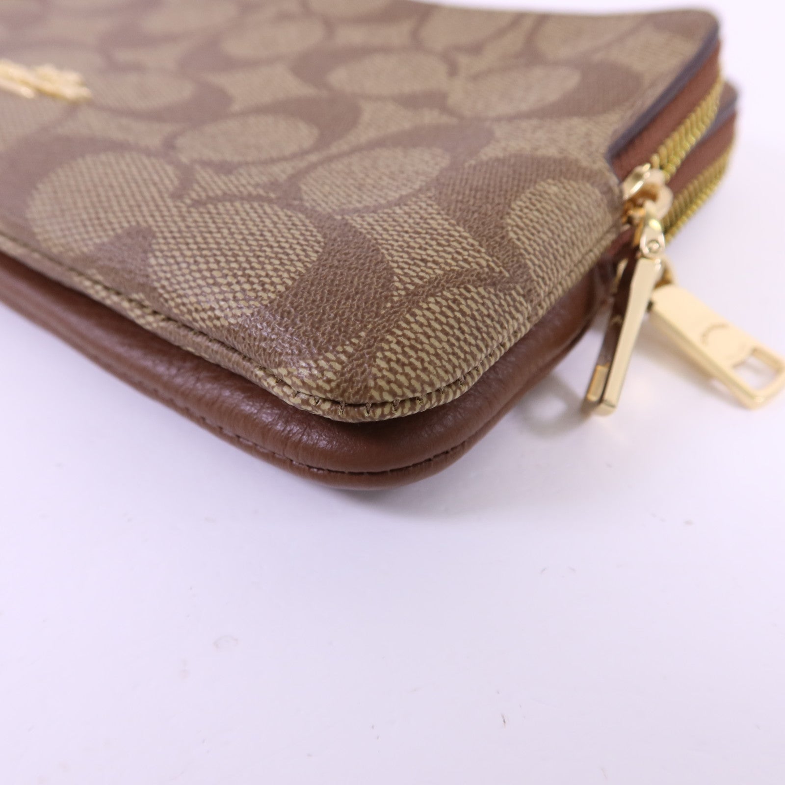 COACH 塗層帆布/牛皮皮革Pouch金扣手拿包