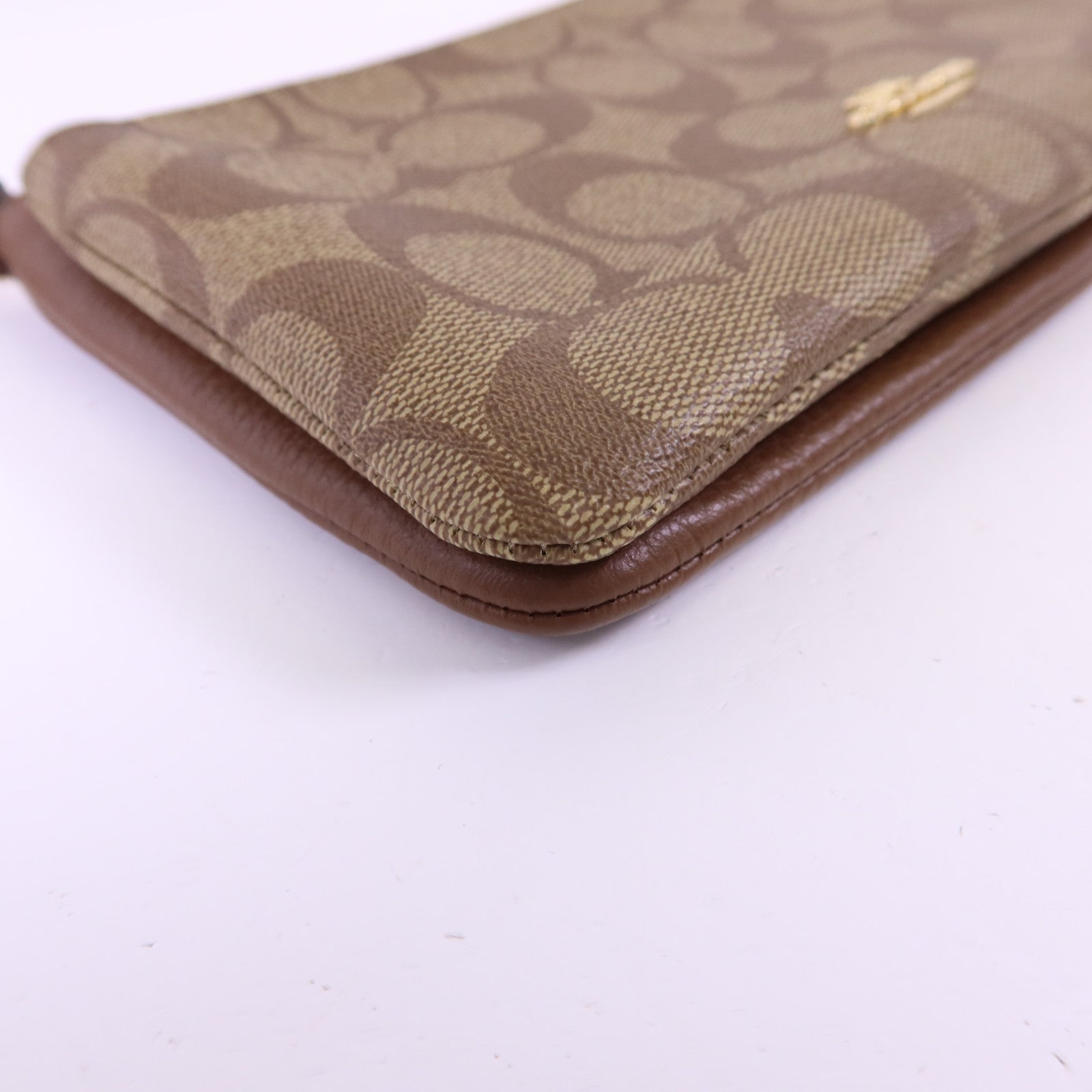 COACH 塗層帆布/牛皮皮革Pouch金扣手拿包