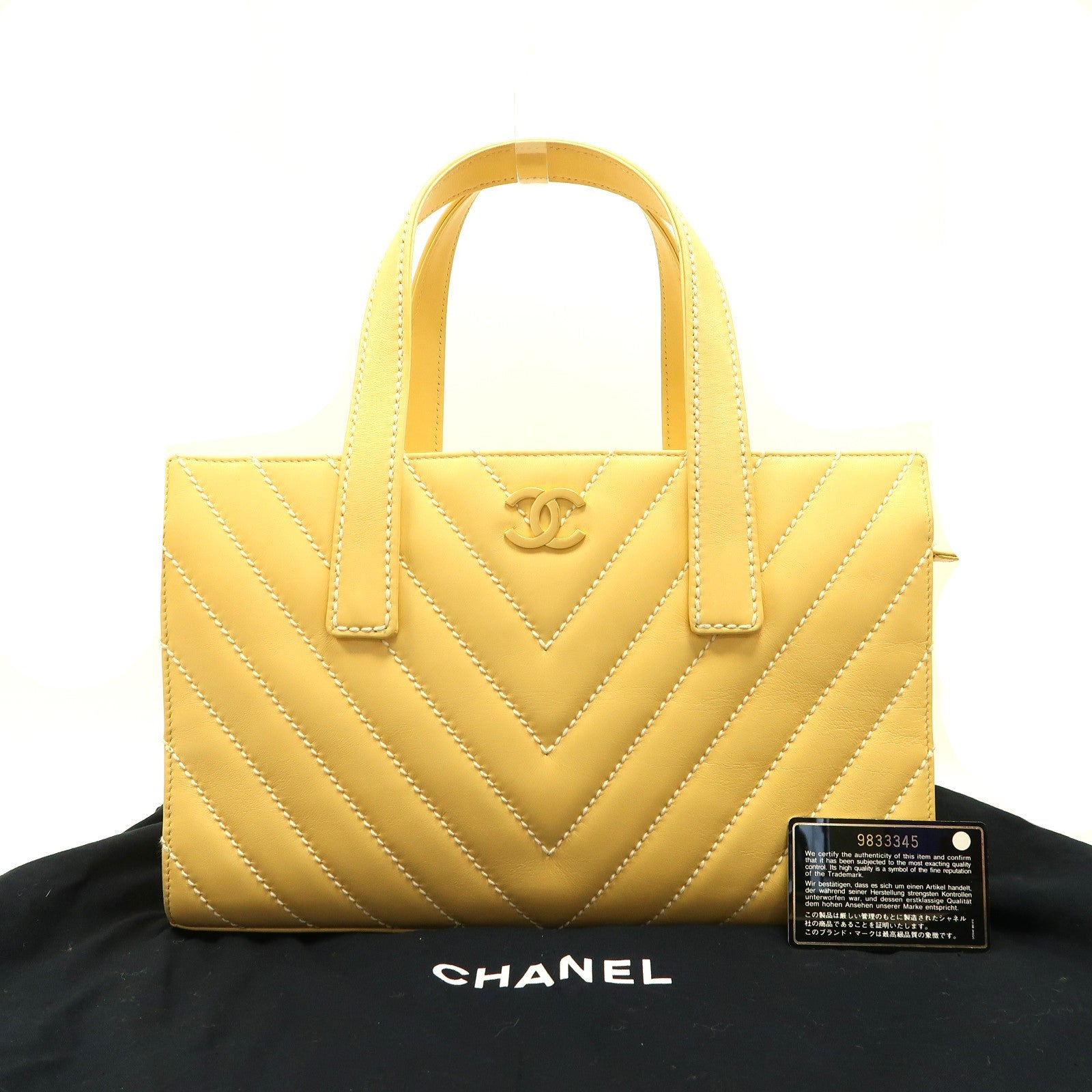 CHANEL 斜紋牛皮皮革Vintage Handbag金扣手挽袋黃色