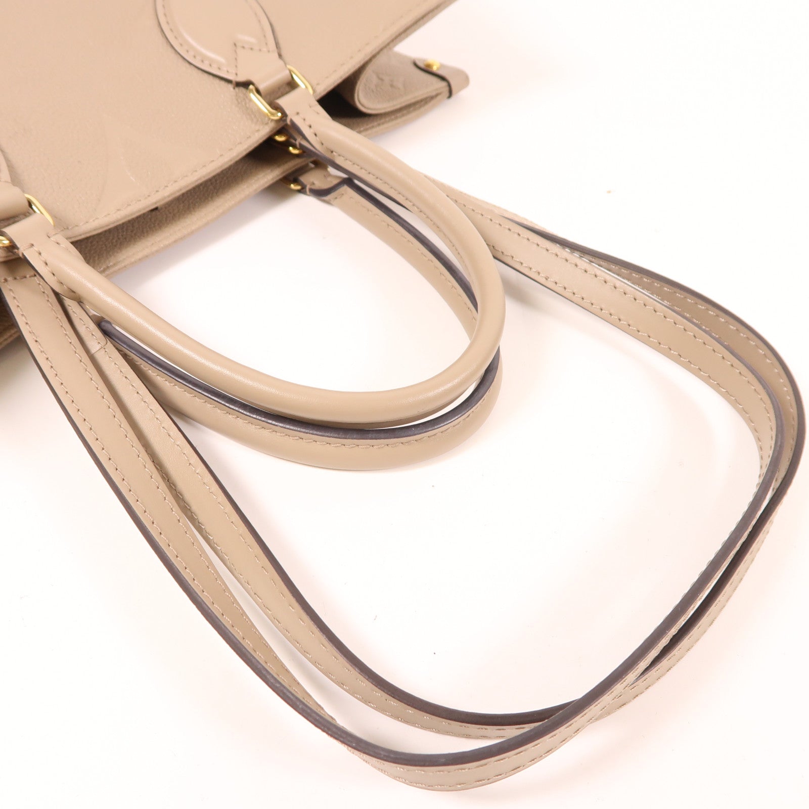 LOUIS VUITTON Monogram Empreinte OnTheGo MM金扣手挽肩背兩用袋米色