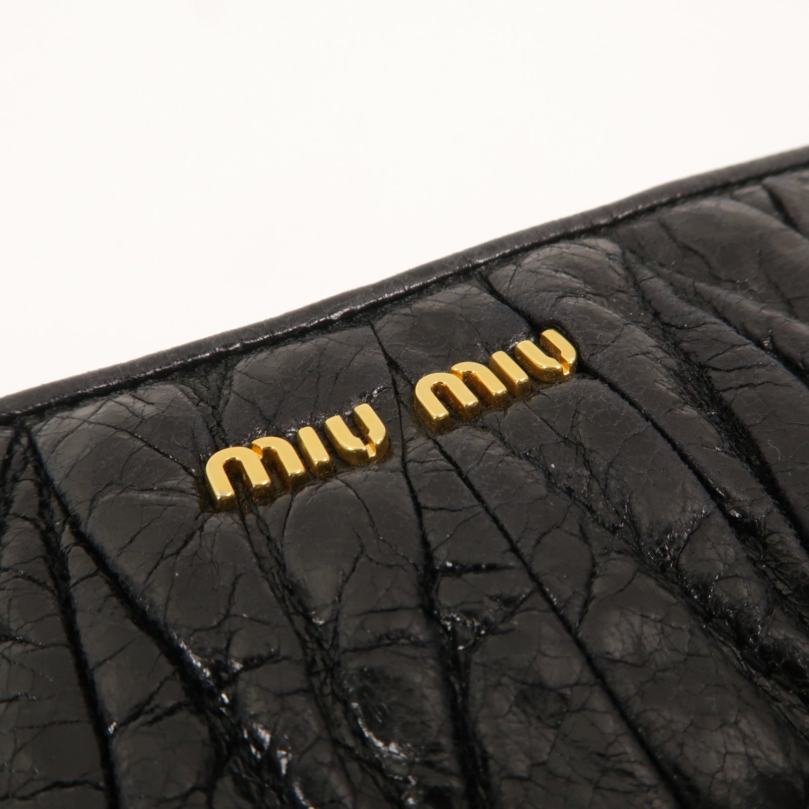 Miu Miu 羊皮皮革Matelasse Pouch手拿包