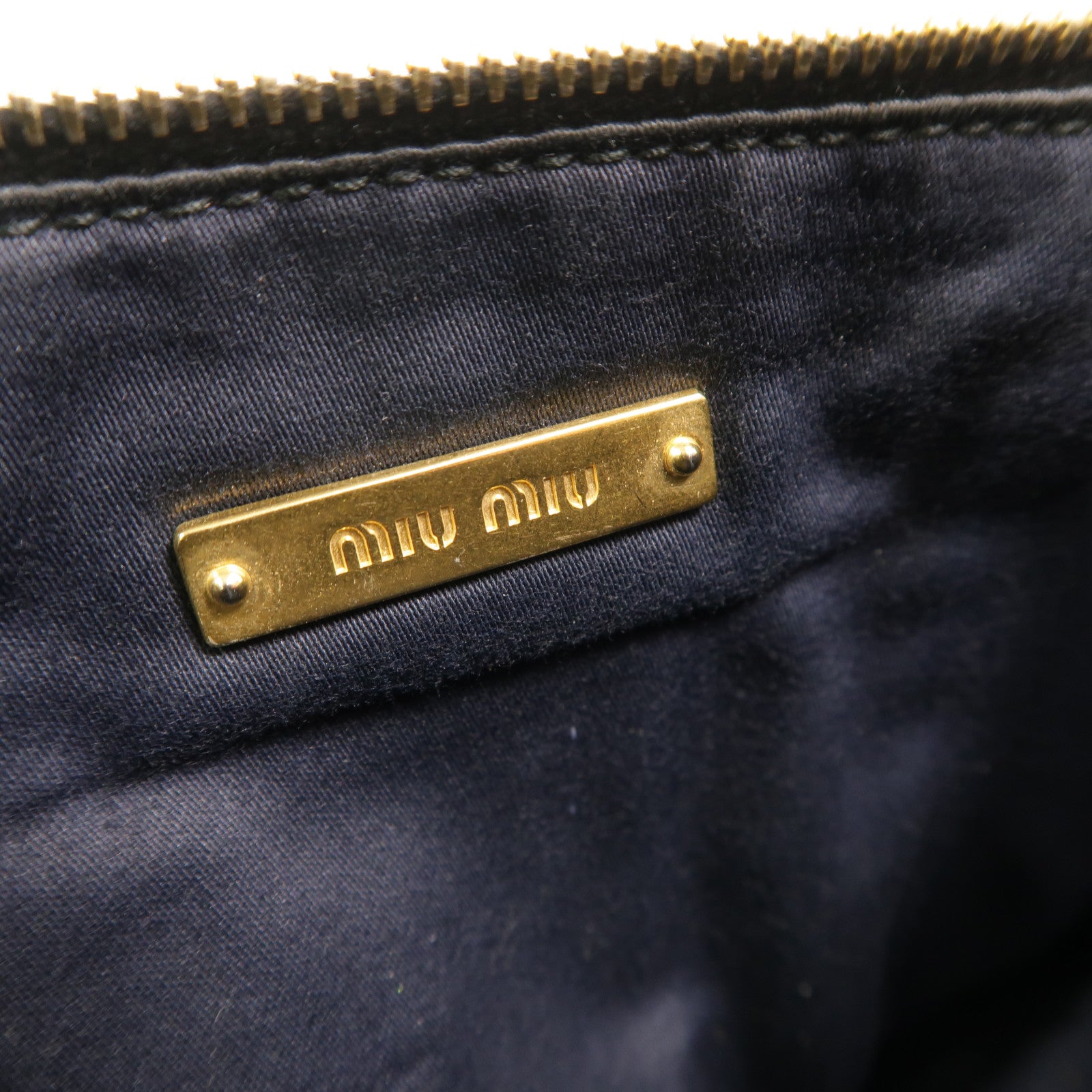 Miu Miu 羊皮皮革Matelasse Pouch手拿包
