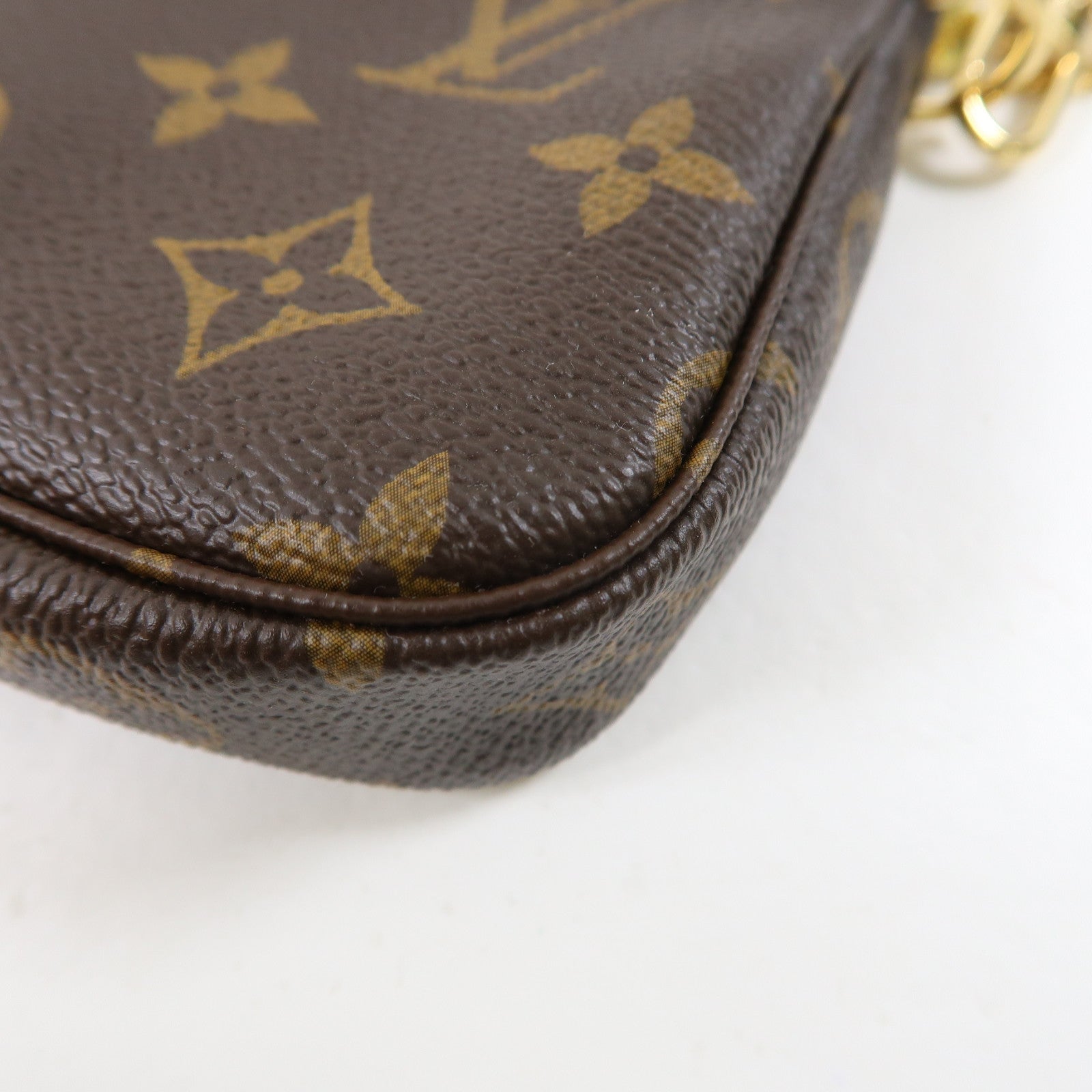 LOUIS VUITTON Monogram Mini Pochette Accessoires金扣手挽袋啡色/彩色