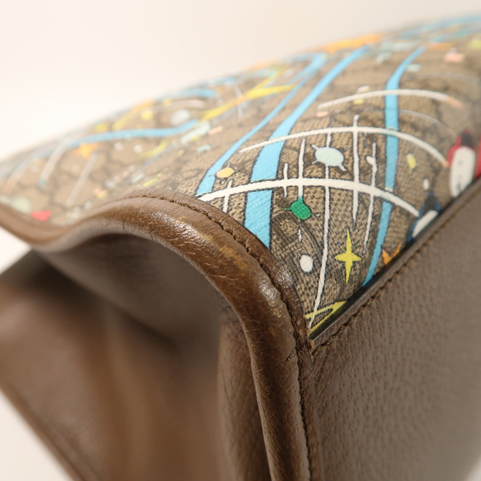GUCCI 塗層帆布/牛皮皮革Gucci x Disney Donald Duck金扣手挽袋