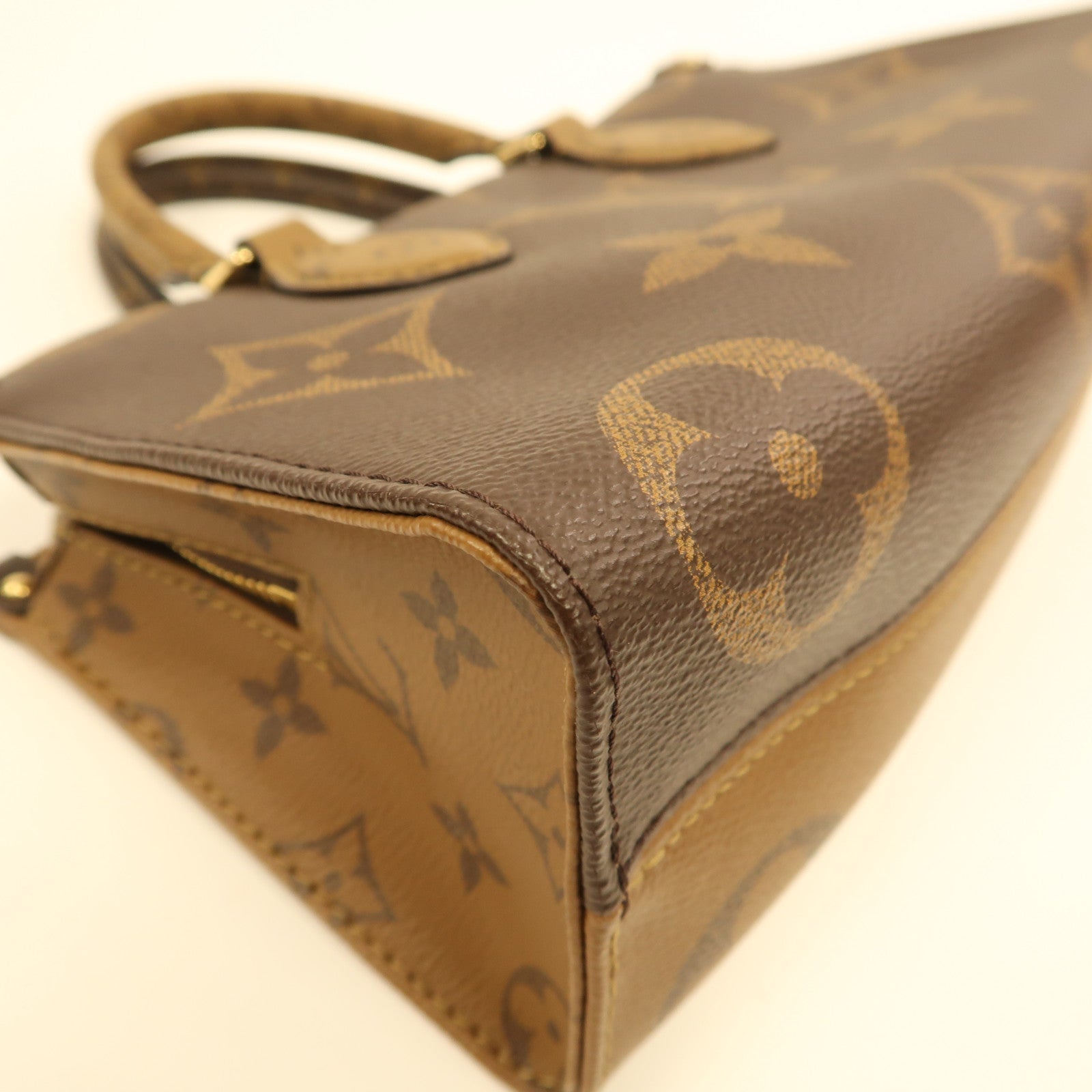 LOUIS VUITTON Monogram On The Go Eastwest金扣手挽肩背兩用袋啡色