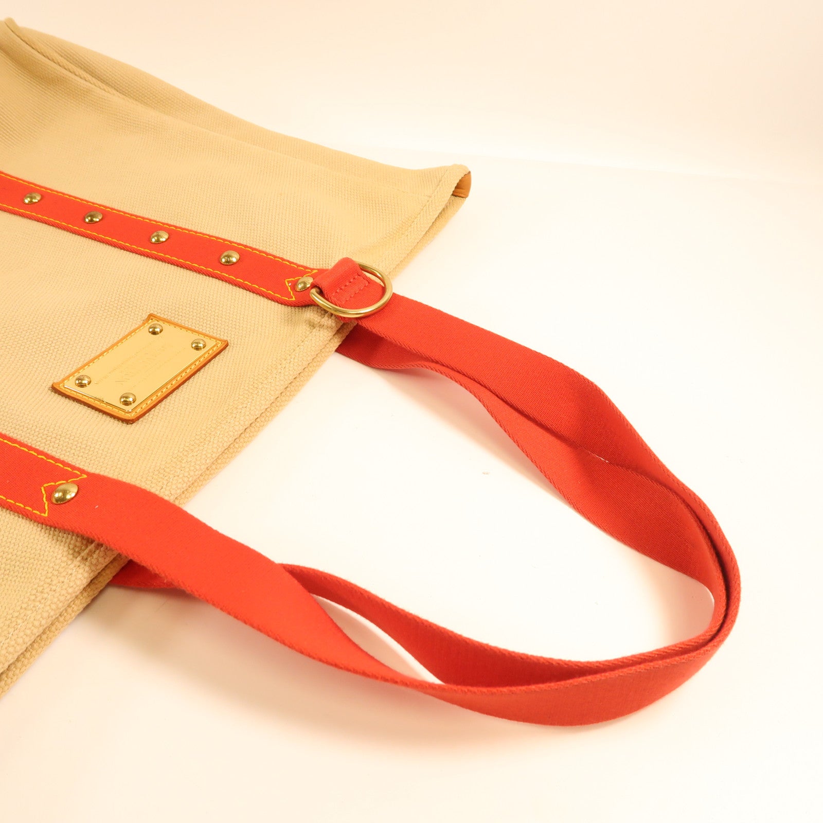 LOUIS VUITTON 帆布Antigua Cabas GM金扣手挽袋米色/紅色