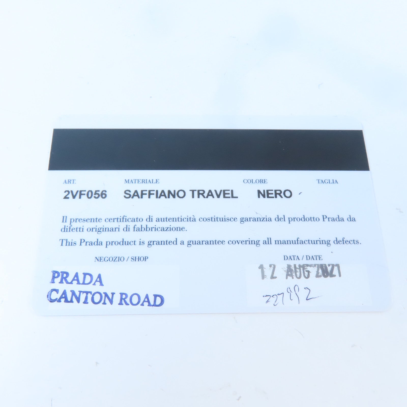 PRADA 牛皮皮革Travel Clutch銀扣手拿包黑色
