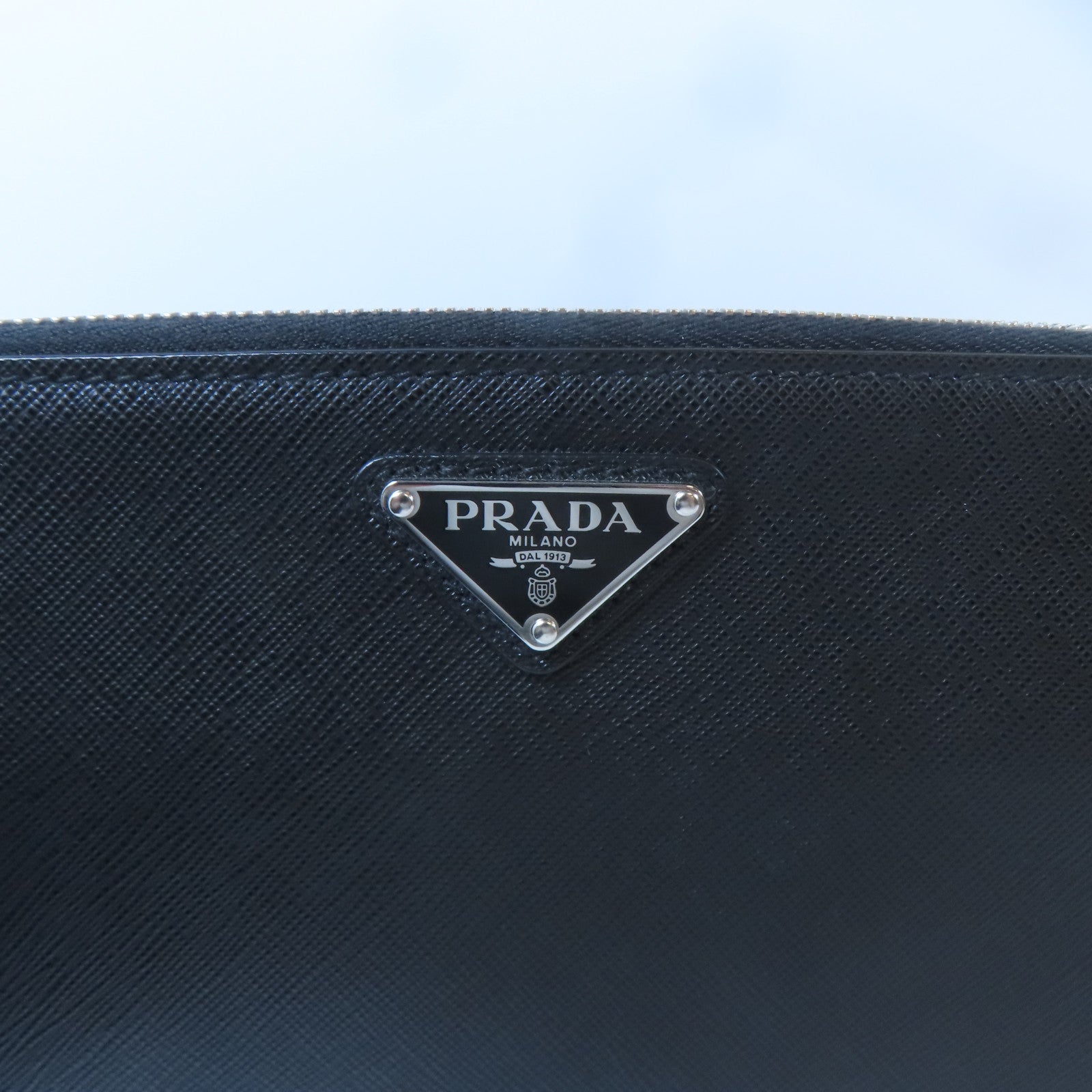 PRADA 牛皮皮革Travel Clutch銀扣手拿包黑色