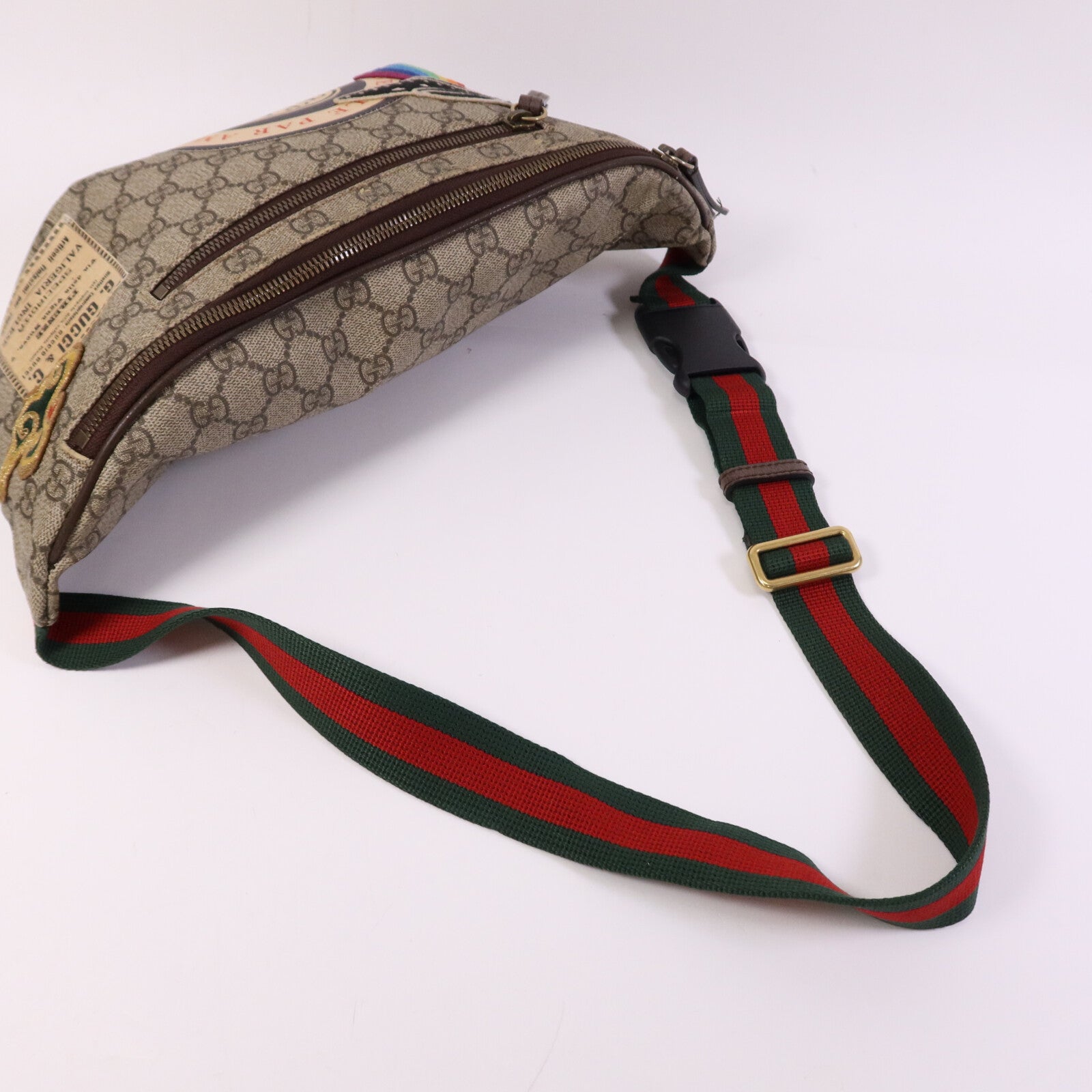GUCCI 塗層帆布GG Supreme Courrier金扣腰包
