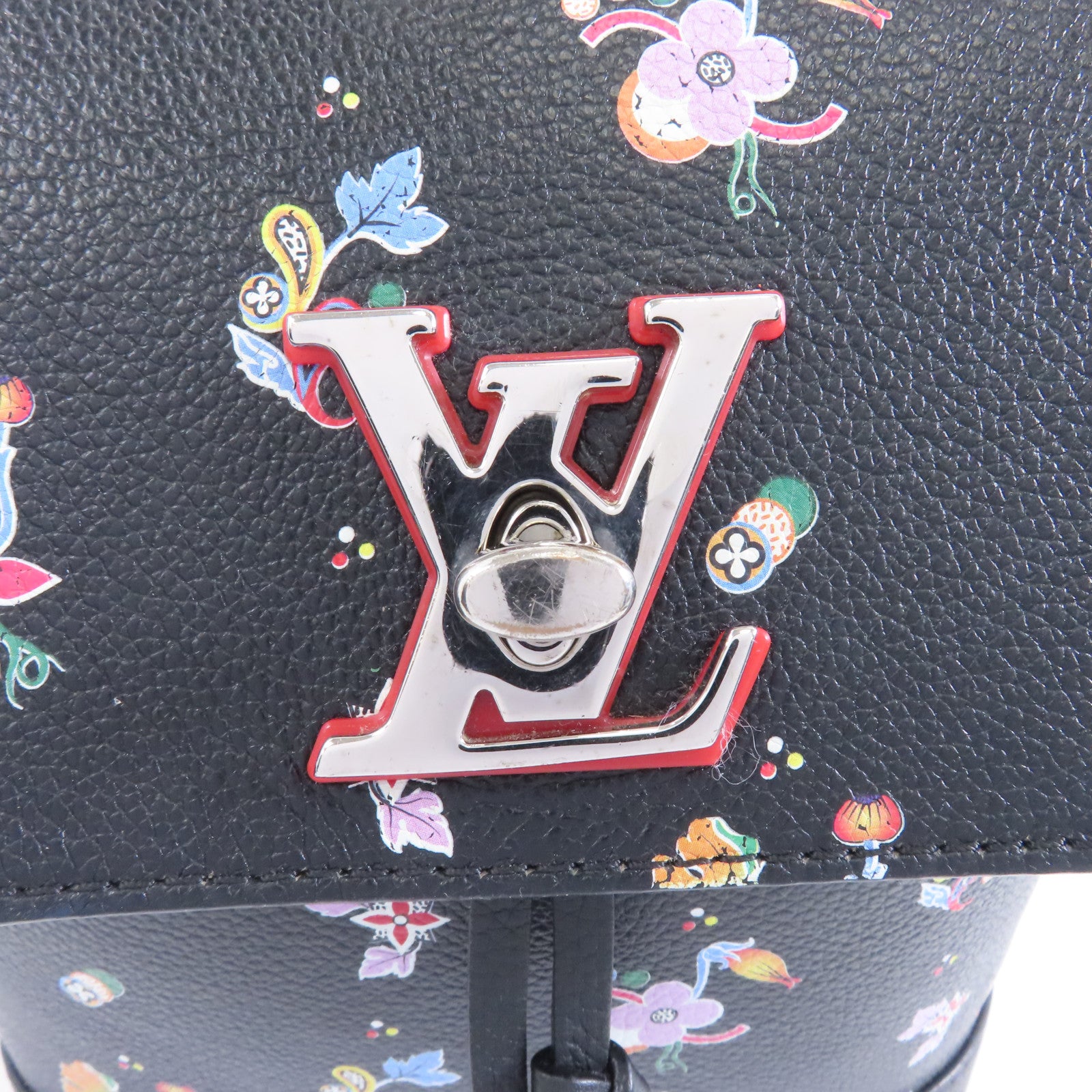 LOUIS VUITTON 牛皮皮革Lock Me Backpack Mini銀扣背包背包