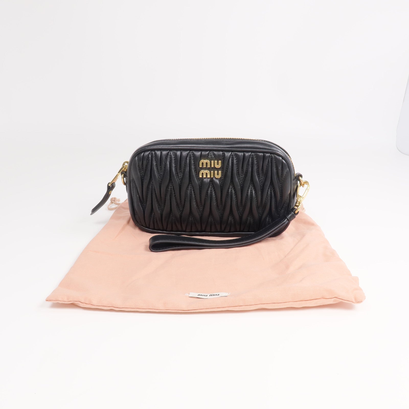 Miu Miu 羊皮皮革Pouch金扣手拿包