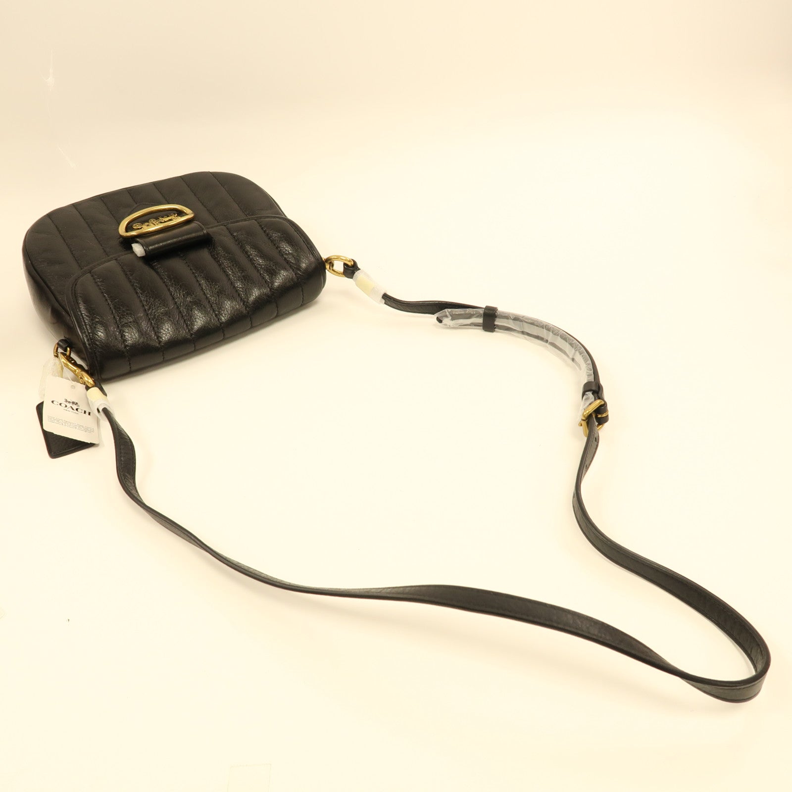 COACH 牛皮皮革Kat Saddle Bag金扣肩背袋黑色