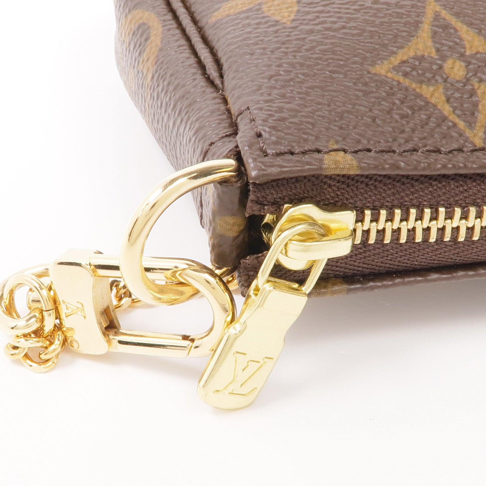 LOUIS VUITTON Monogram Mini Pochette Accessoires金扣手挽袋