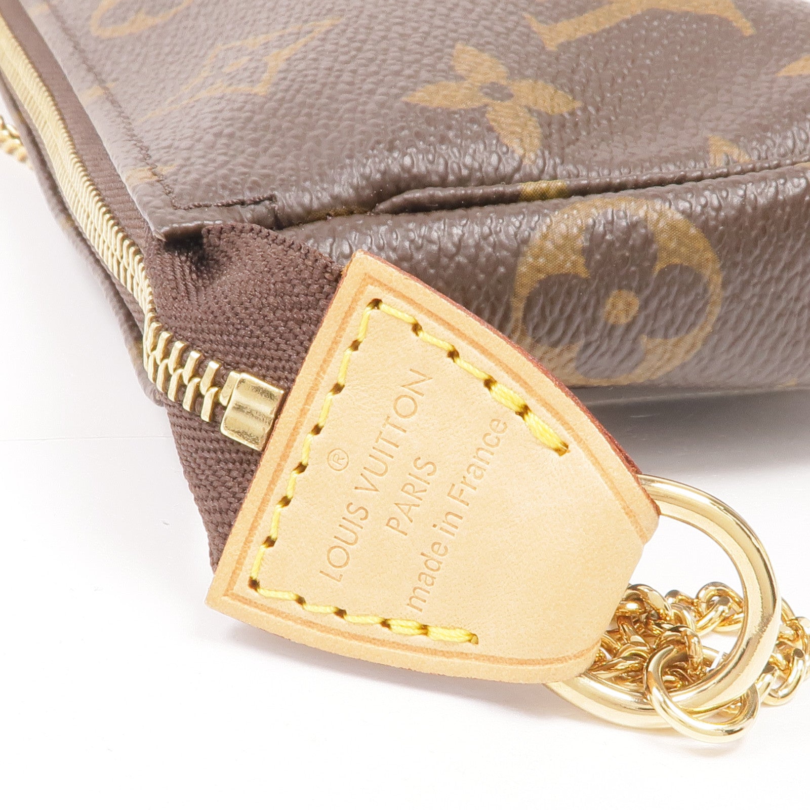 LOUIS VUITTON Monogram Mini Pochette Accessoires金扣手挽袋
