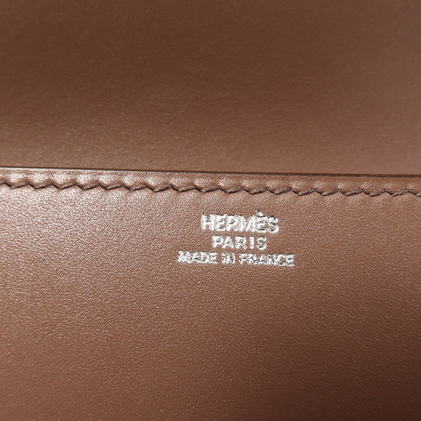 HERMES Tadelat皮革Medor 23手拿包Griolet