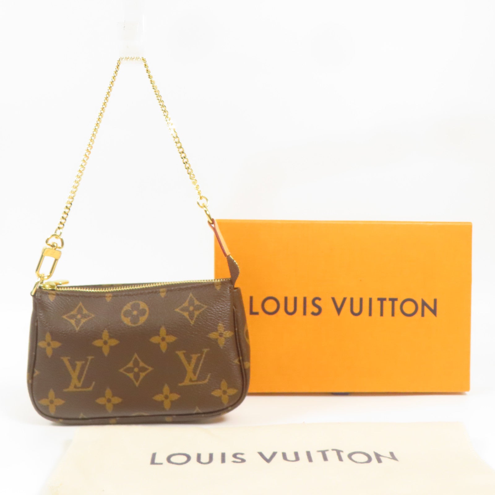 LOUIS VUITTON Monogram Mini Pochette Accessoires金扣手挽袋