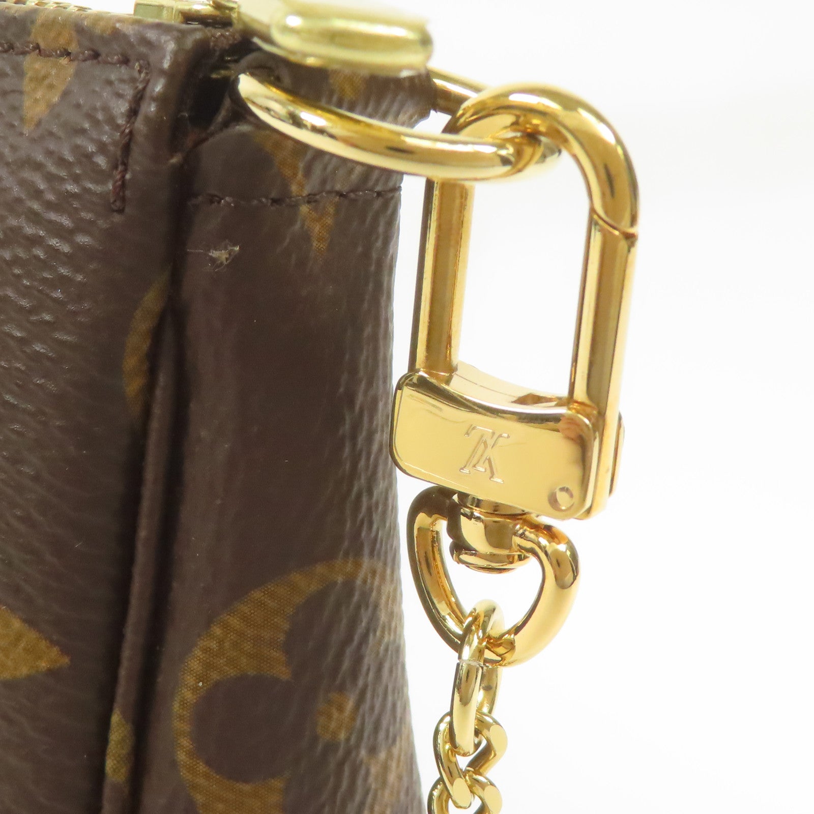 LOUIS VUITTON Monogram Mini Pochette Accessoires金扣手挽袋