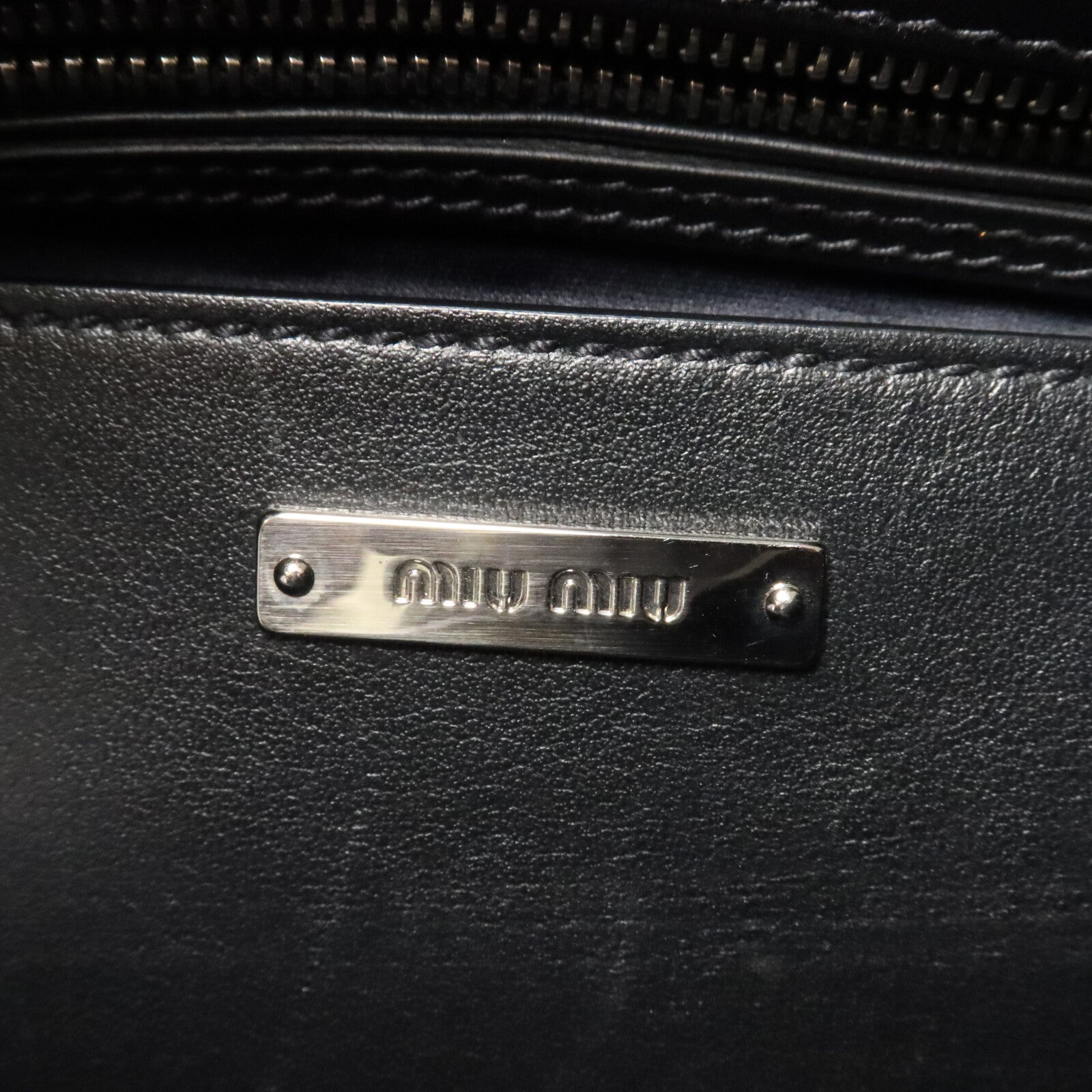 Miu Miu 羊皮皮革Hobo肩背袋