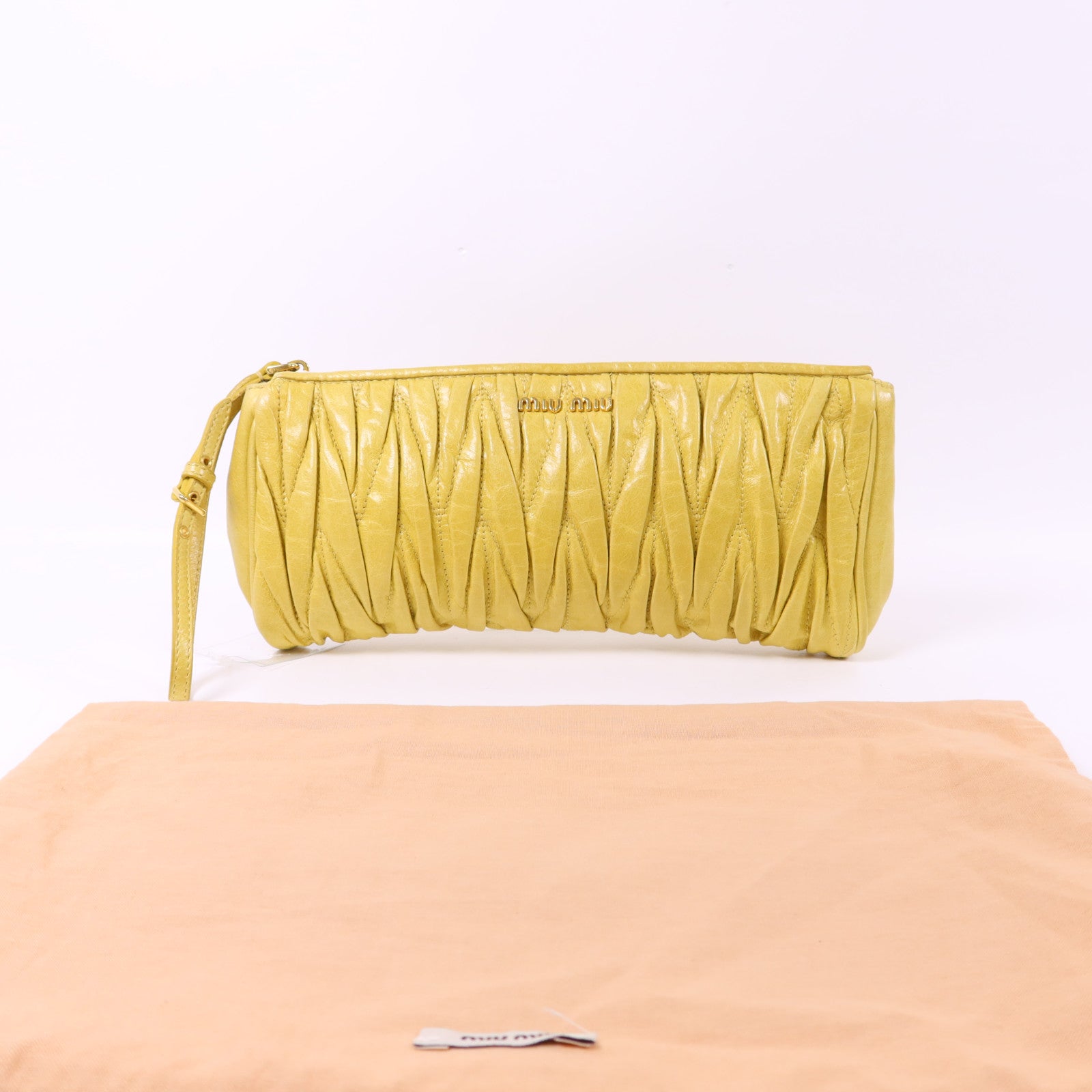 Miu Miu 牛皮皮革Clutch Bag金扣手拿包