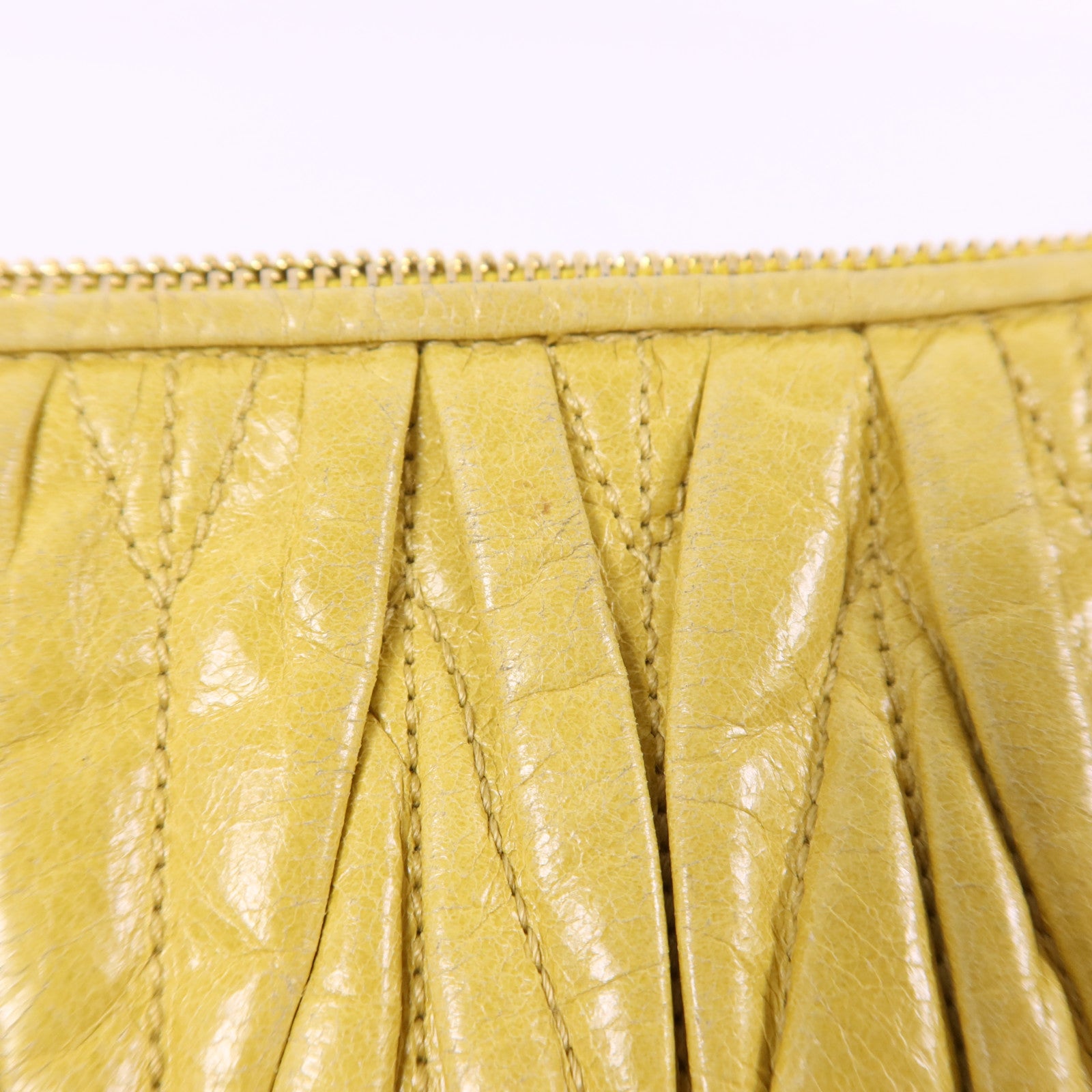 Miu Miu 牛皮皮革Clutch Bag金扣手拿包