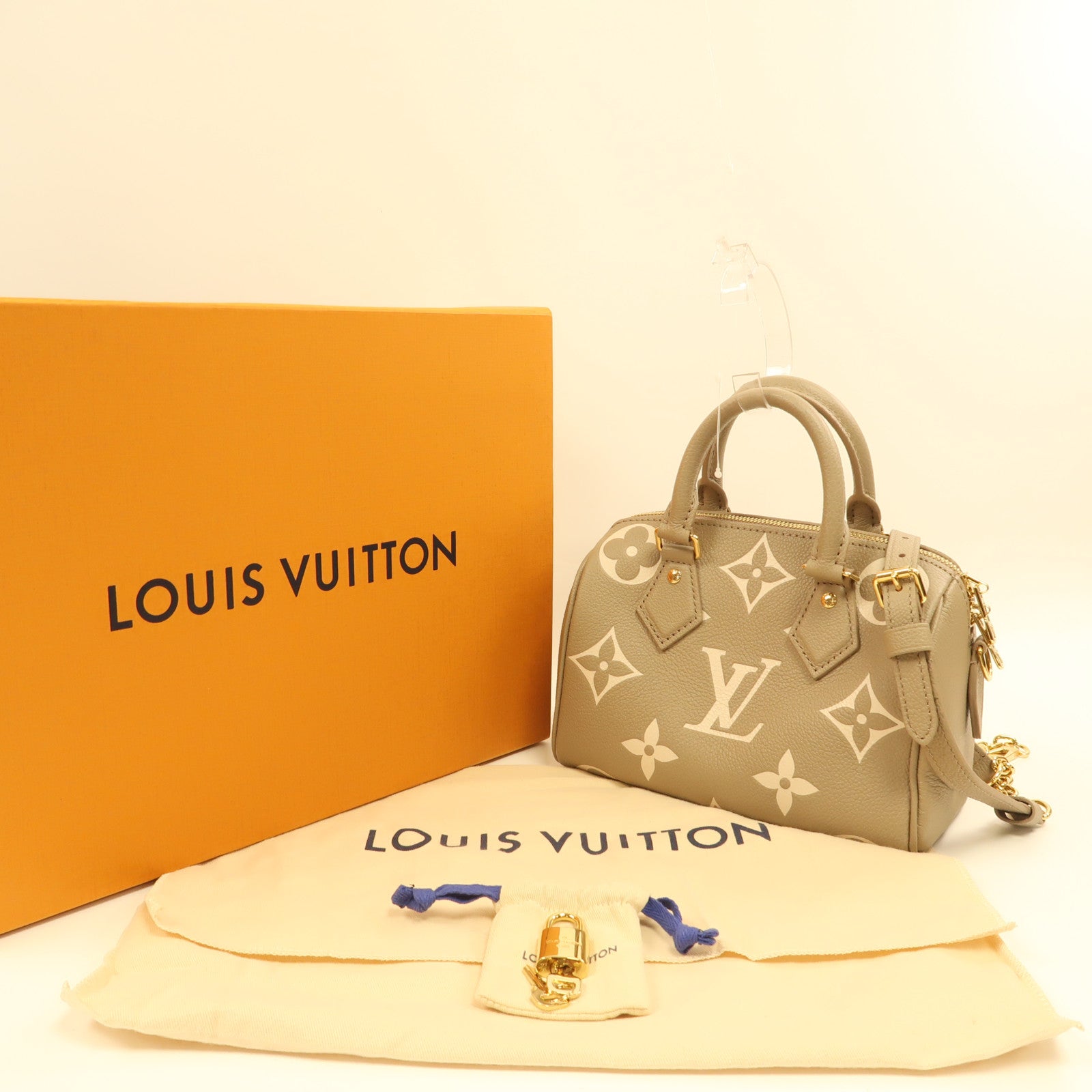 LOUIS VUITTON Monogram Empreinte Speedy Bandouliere 20金扣手挽肩背兩用袋米色