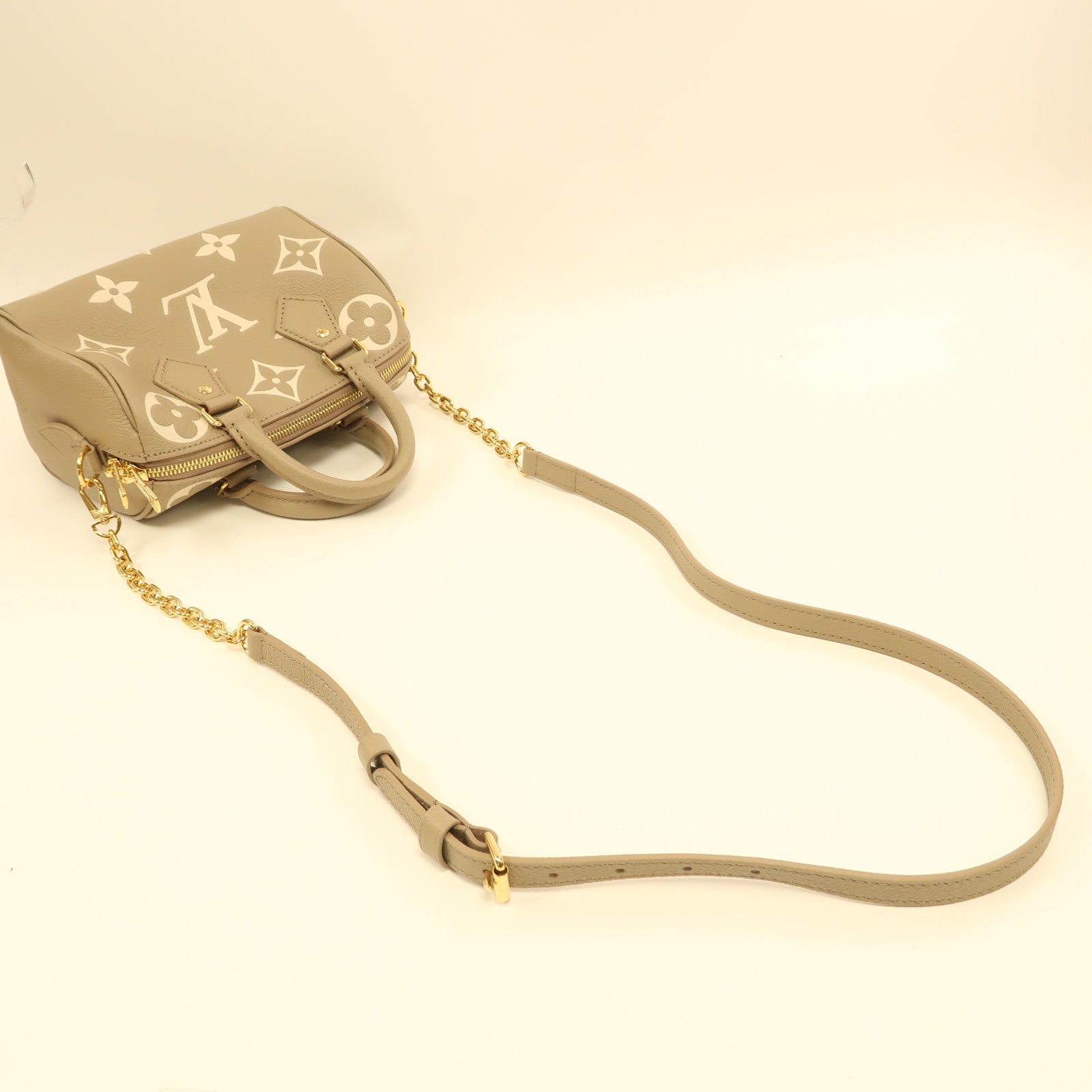 LOUIS VUITTON Monogram Empreinte Speedy Bandouliere 20金扣手挽肩背兩用袋米色