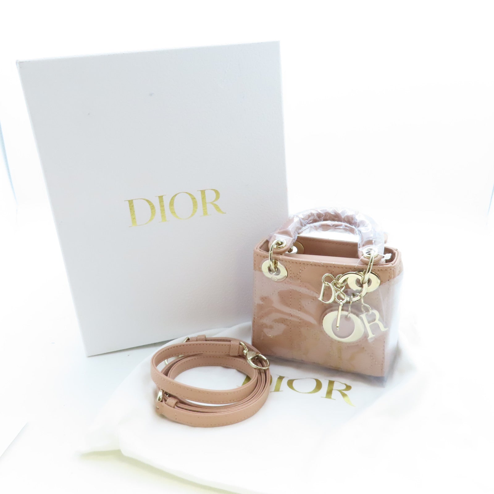 Dior 羊皮皮革Lady Dior Micro Bag金扣手拿包玫瑰色