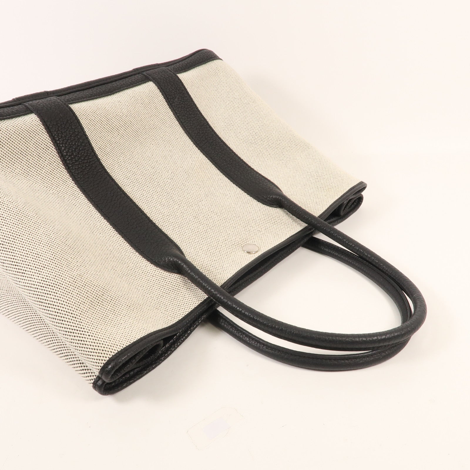 HERMES 帆布Garden Party PM銀扣手挽袋Black/White