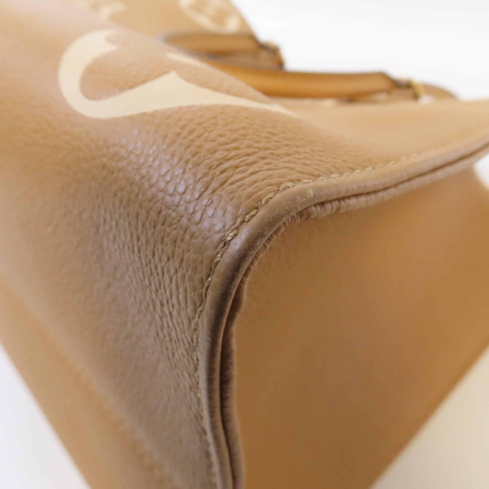 LOUIS VUITTON Monogram Empreinte On The Go MM金扣手挽肩背兩用袋駝色