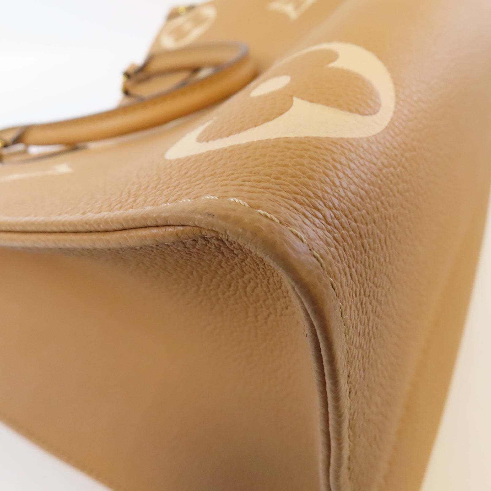 LOUIS VUITTON Monogram Empreinte On The Go MM金扣手挽肩背兩用袋駝色
