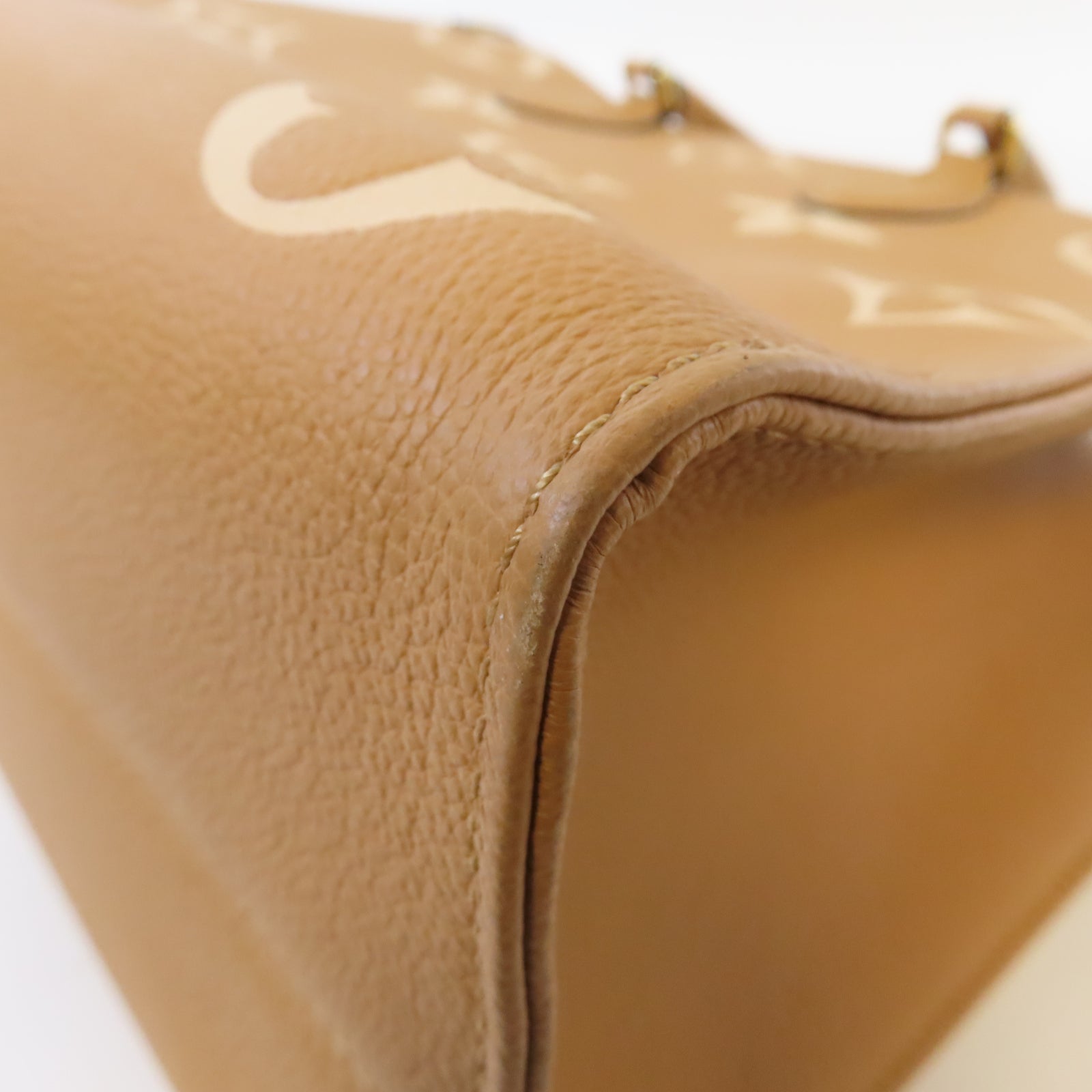 LOUIS VUITTON Monogram Empreinte On The Go MM金扣手挽肩背兩用袋駝色