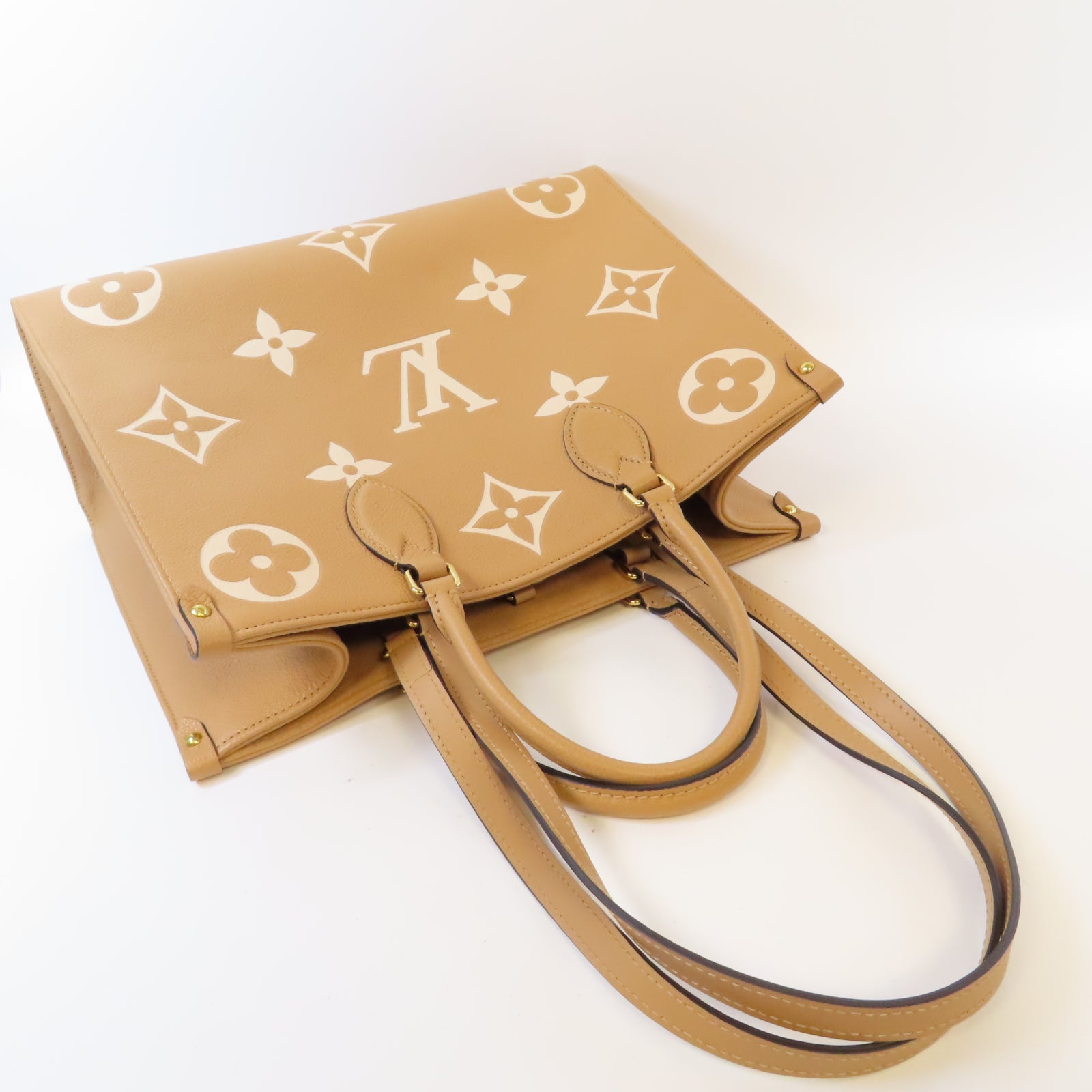 LOUIS VUITTON Monogram Empreinte On The Go MM金扣手挽肩背兩用袋駝色