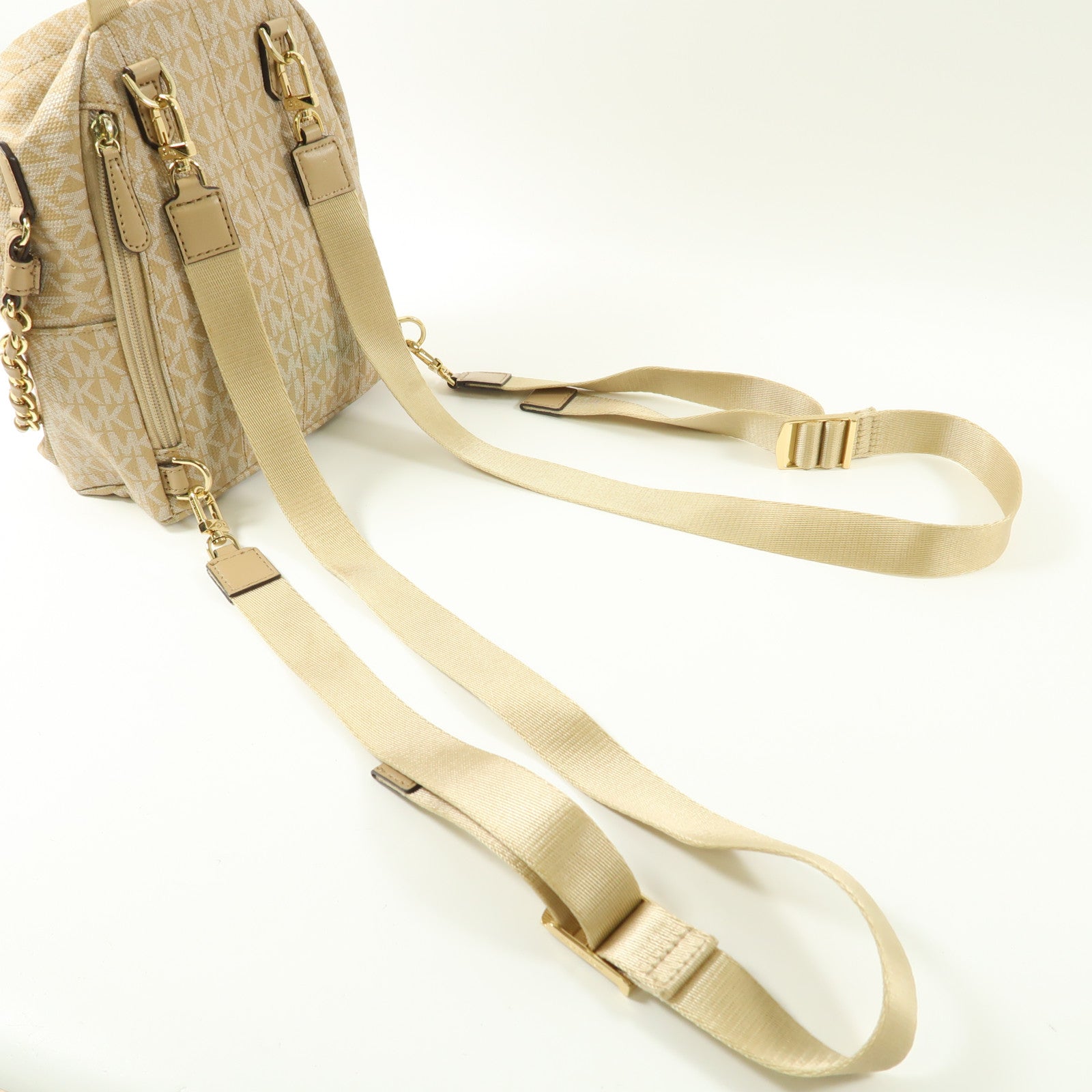 Michael Kors 塗層帆布Backpack金扣背包杏色/淺褐色